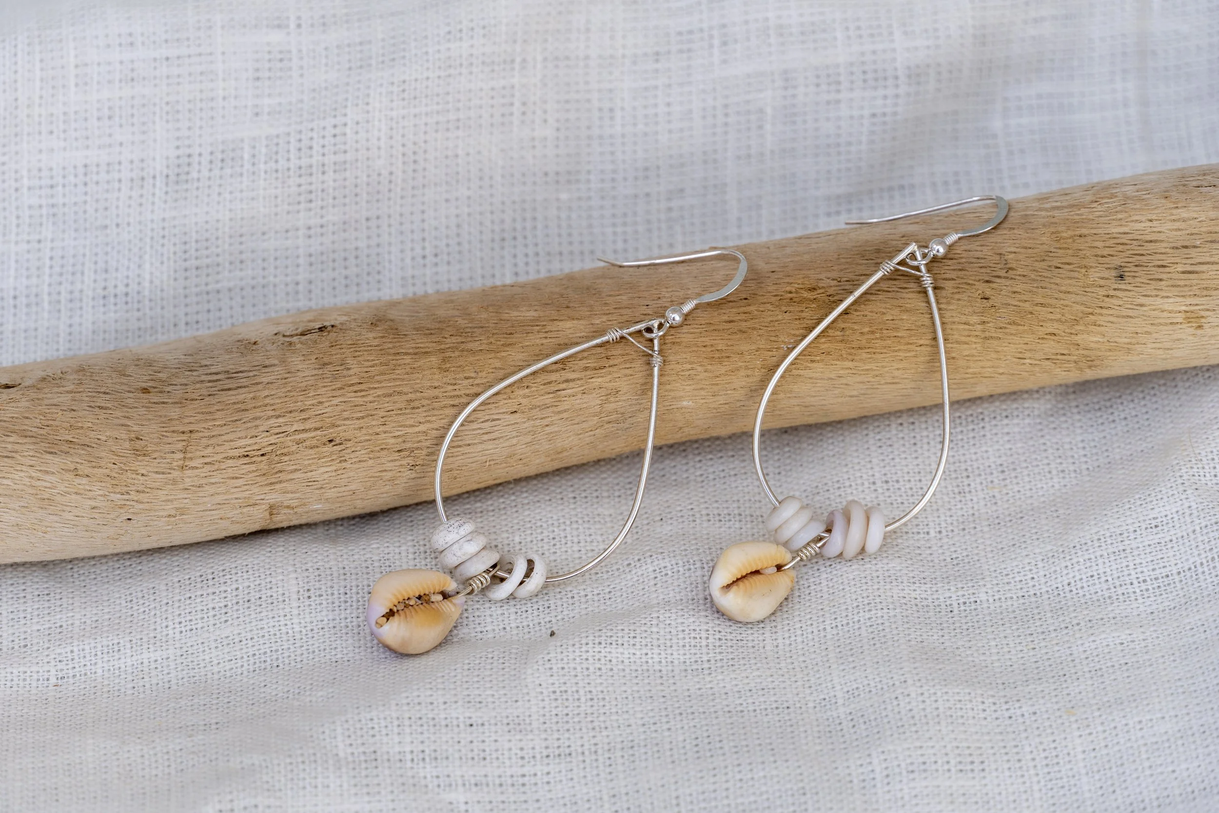 cowrie teardrop earrings!