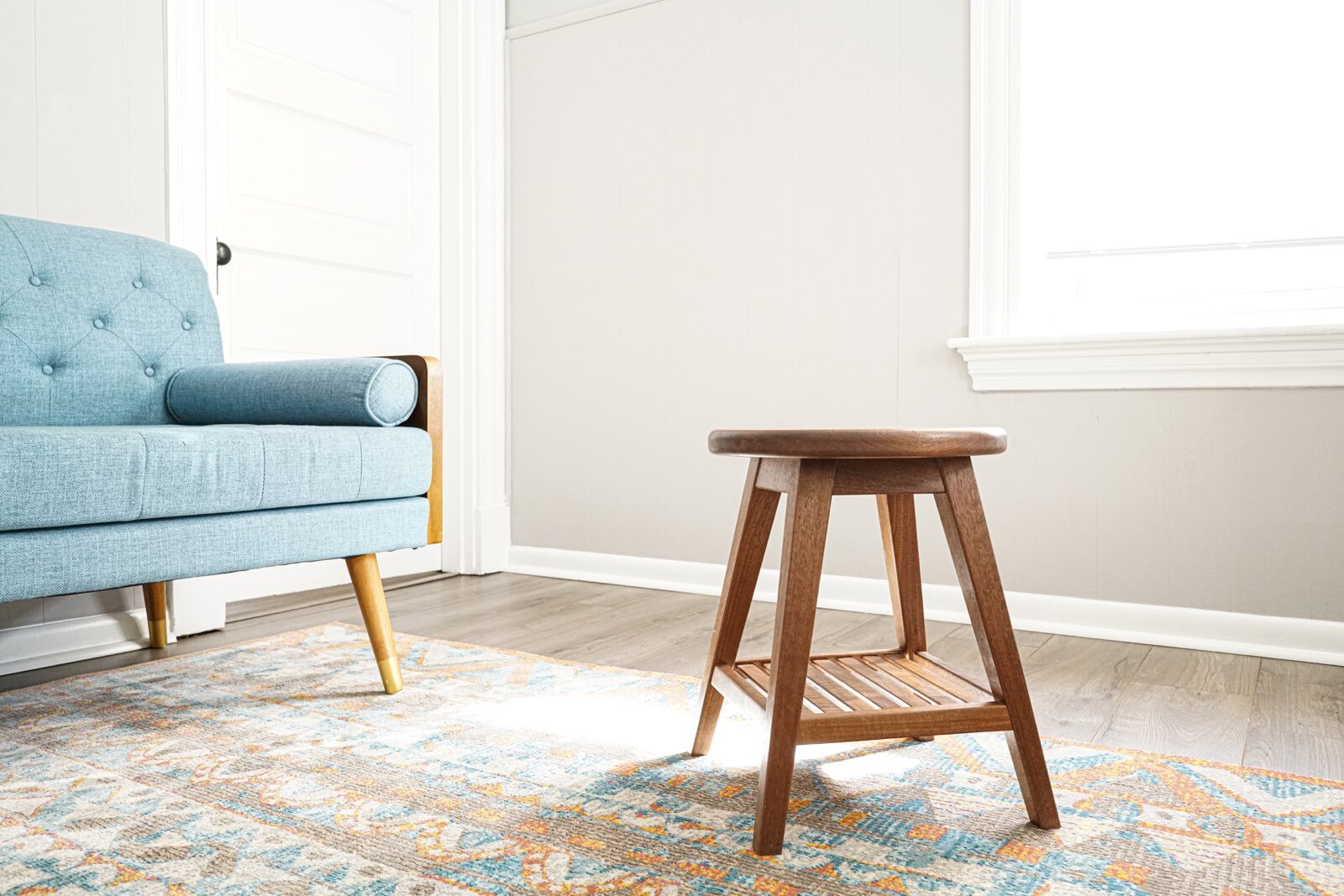 Simple stool with shelf.