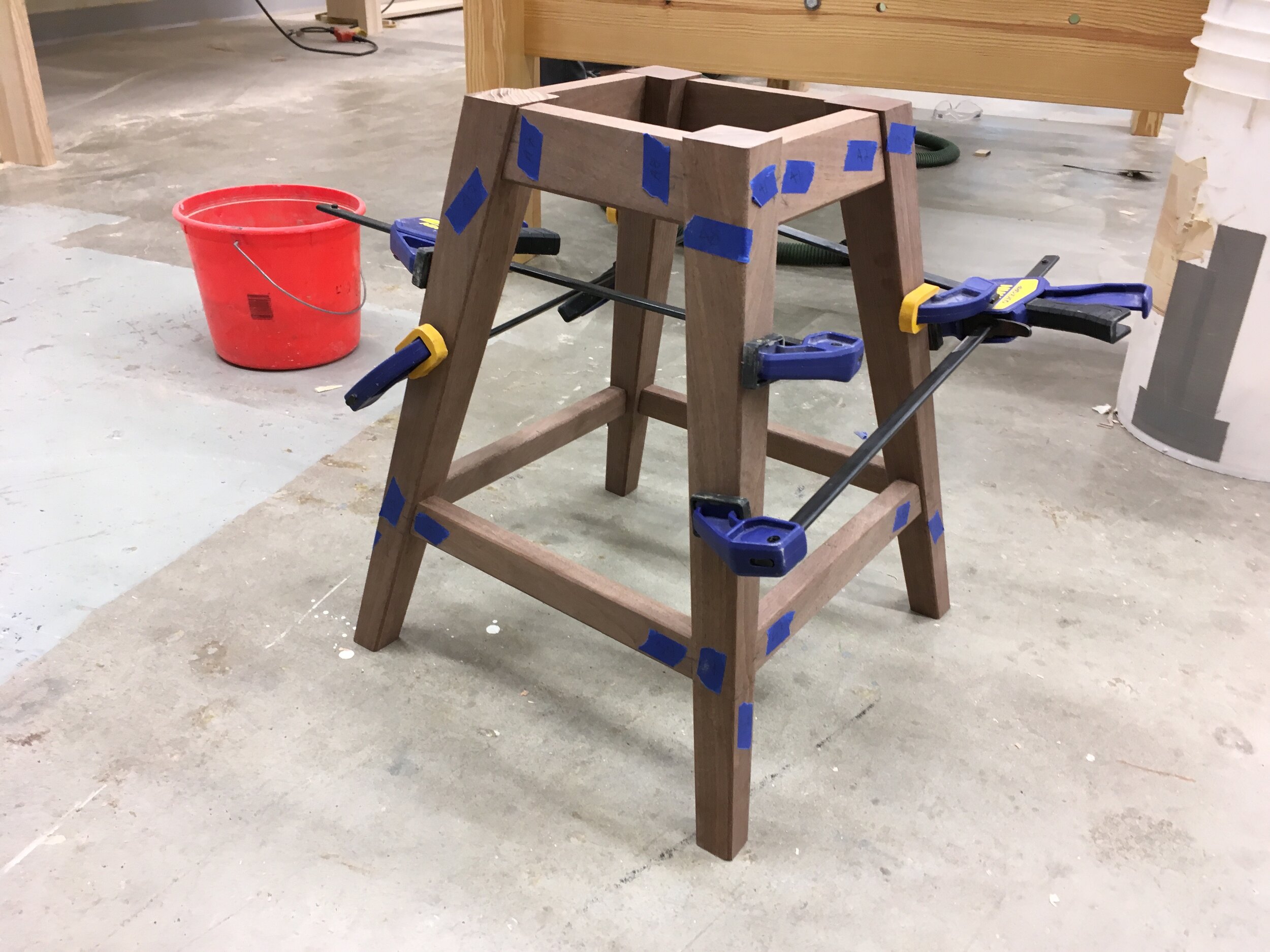 Simple stool with shelf.