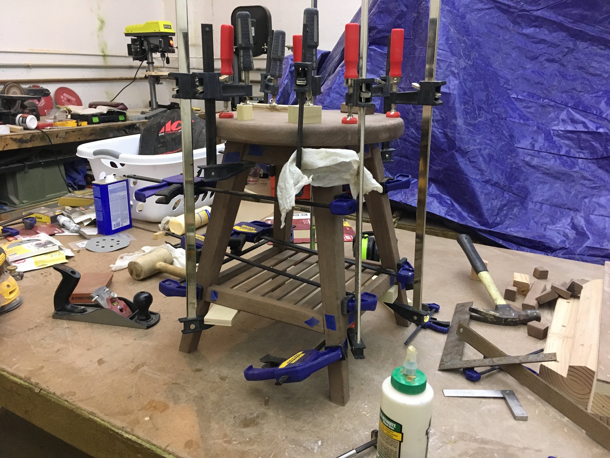 Simple stool with shelf.
