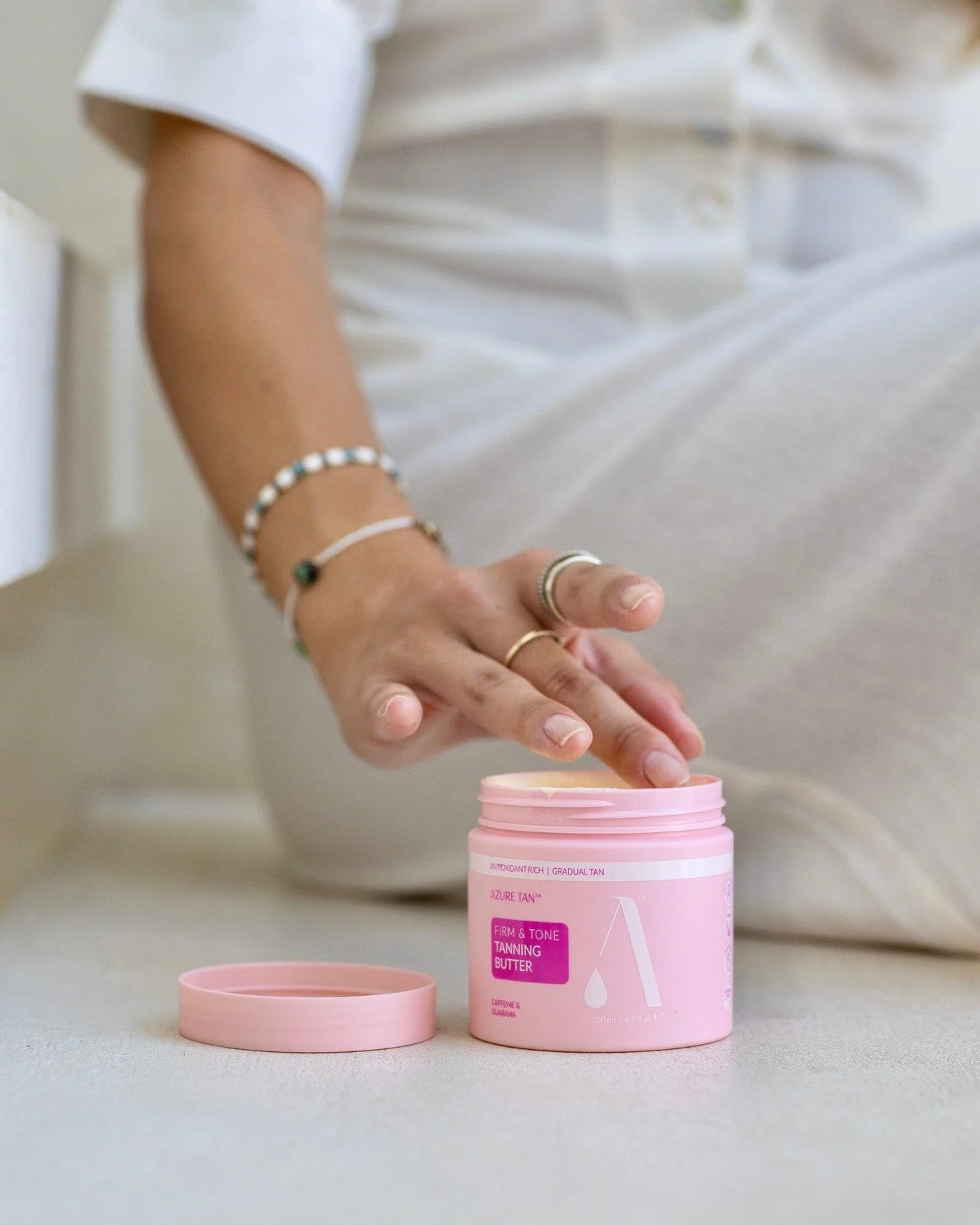 Meet the butter that does everything 😍
Our Azure Firm &amp; Tone Tanning Butter gives you that smooth, hydrated, bronzy glow while helping to firm and smooth the skin. Rich, creamy, and never streaky &mdash; just silky, toned, sun-kissed perfection 