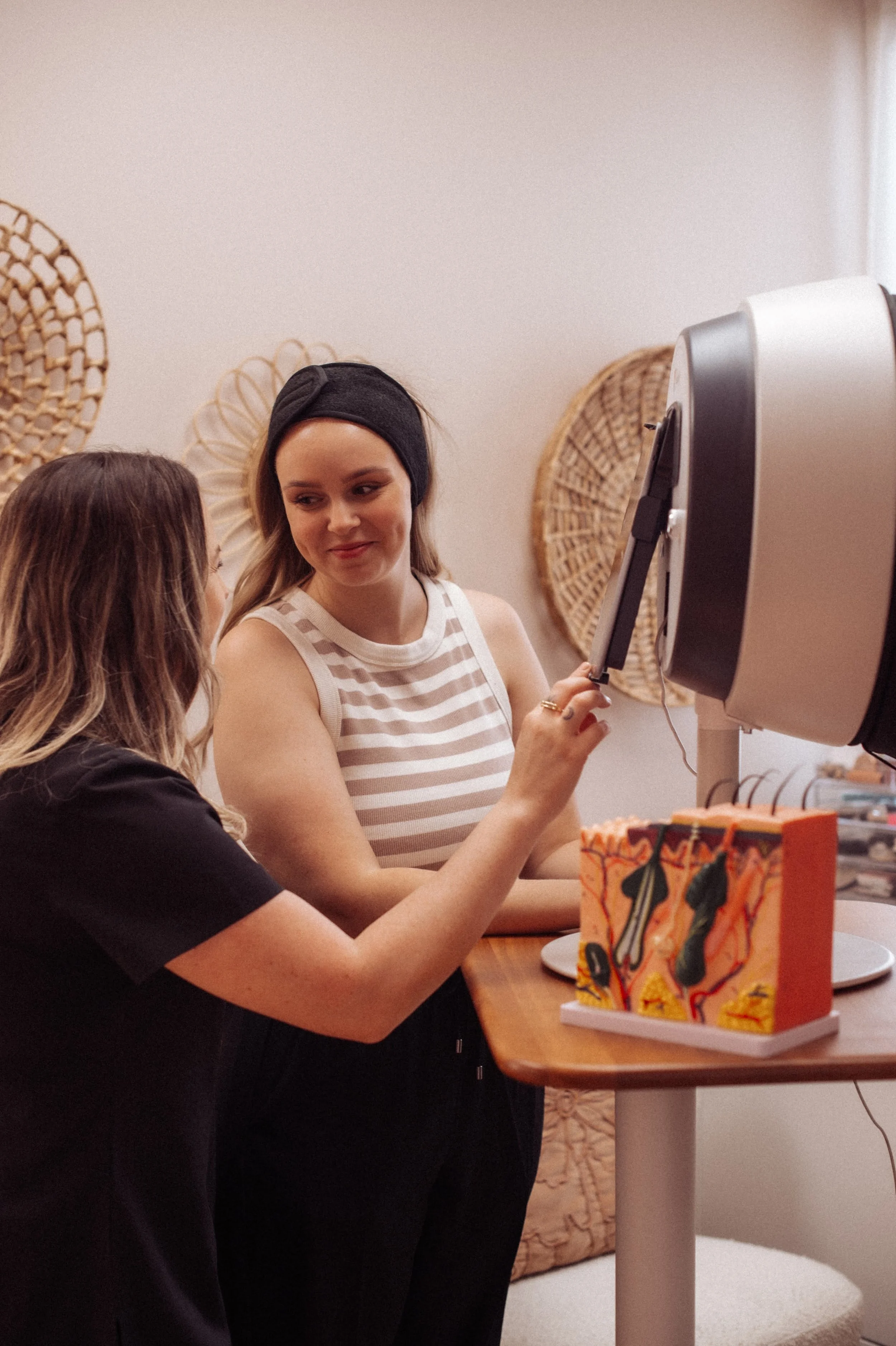 Client having a skin consult using the Observ diagnostic skin imaging analysis. This sees under the layers of the skin and is helpful when recommending facial treatments , cosmetic skin peels and skincare products.