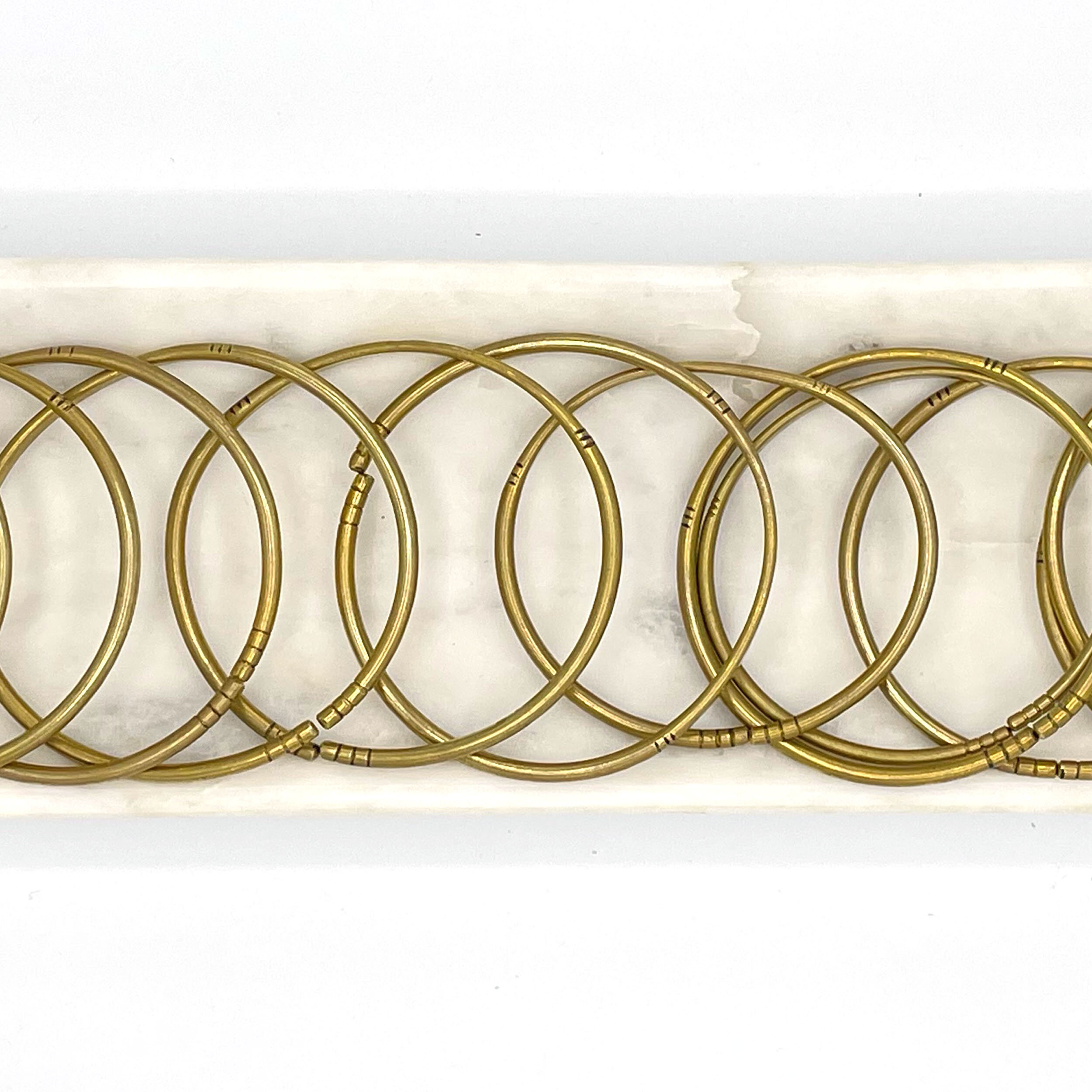 bracelets on marble tray.jpg