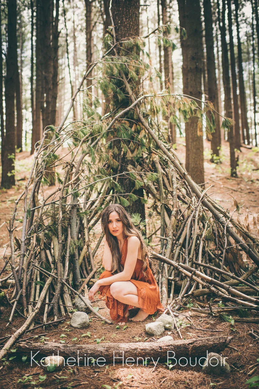 Katherine Henry Boudoir featuring natural makeup by Jane Iredale and RMS beauty. Implied Nudes in the woods with beautiful wavy long hair. Styling by tada - Boston Based Team!