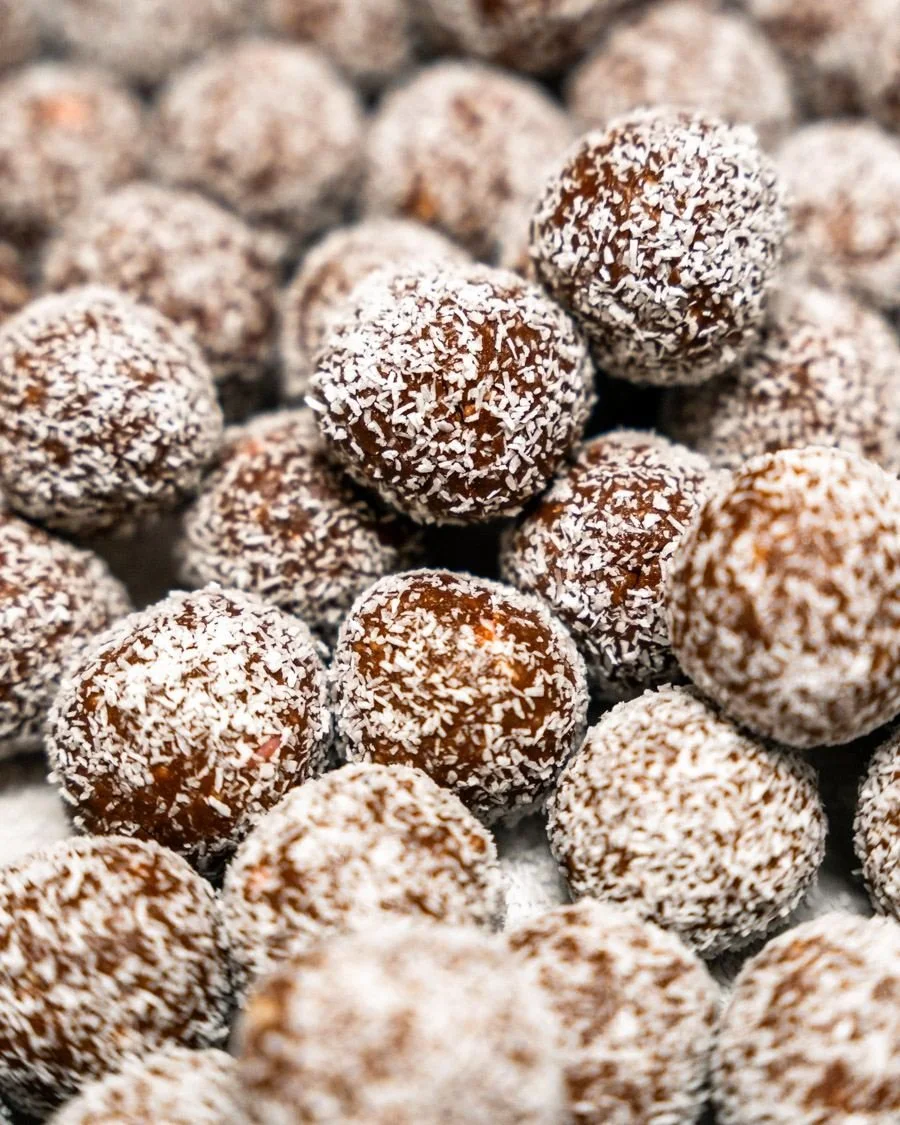 The Christmas treats have said goodbye, but the classics are back! Our delicious chocolate/coconut balls are here &mdash; $6 per tub. You really can&rsquo;t go wrong 😉