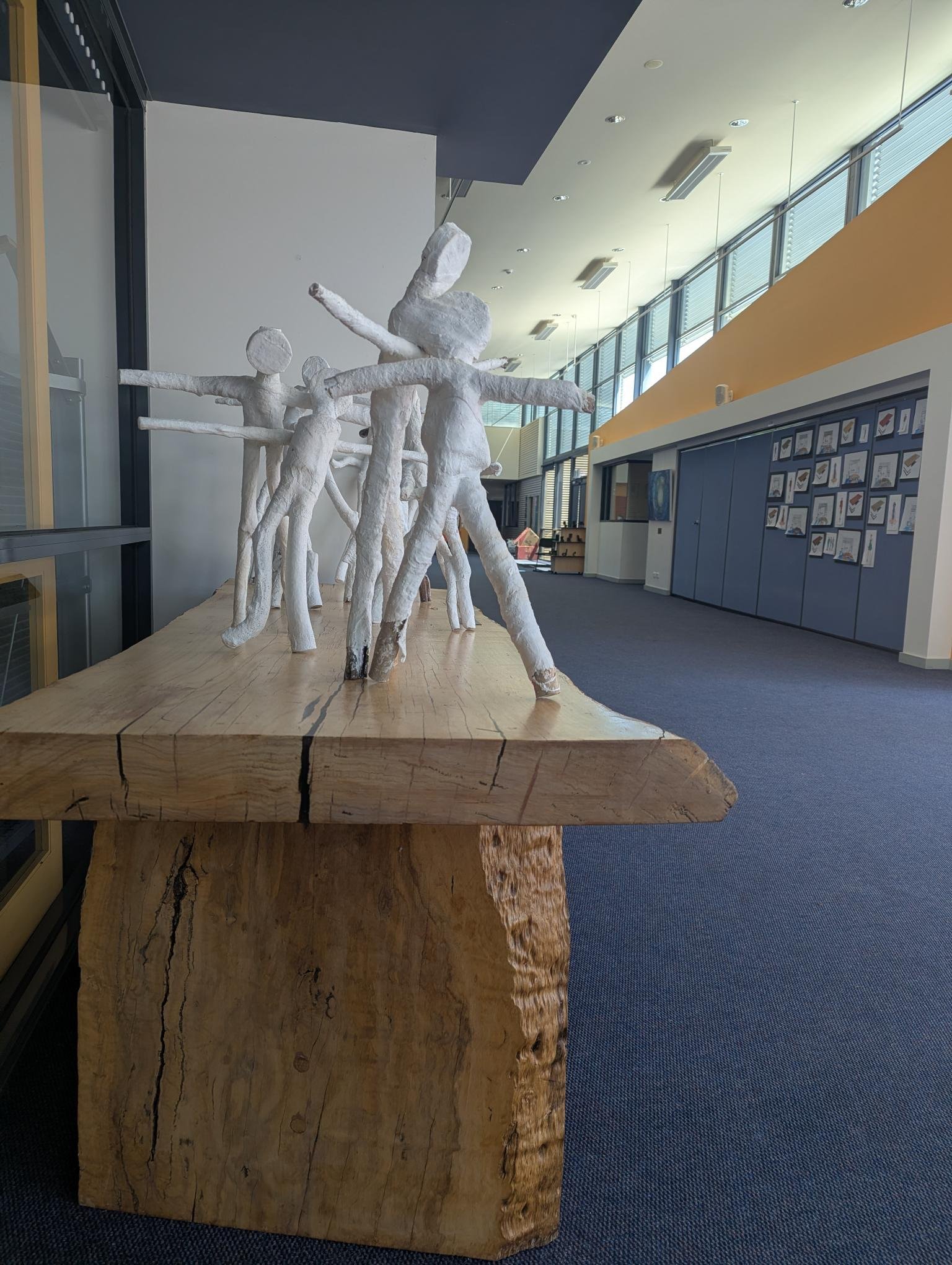 Plaster bandage and natural wood collaborative sculpture 