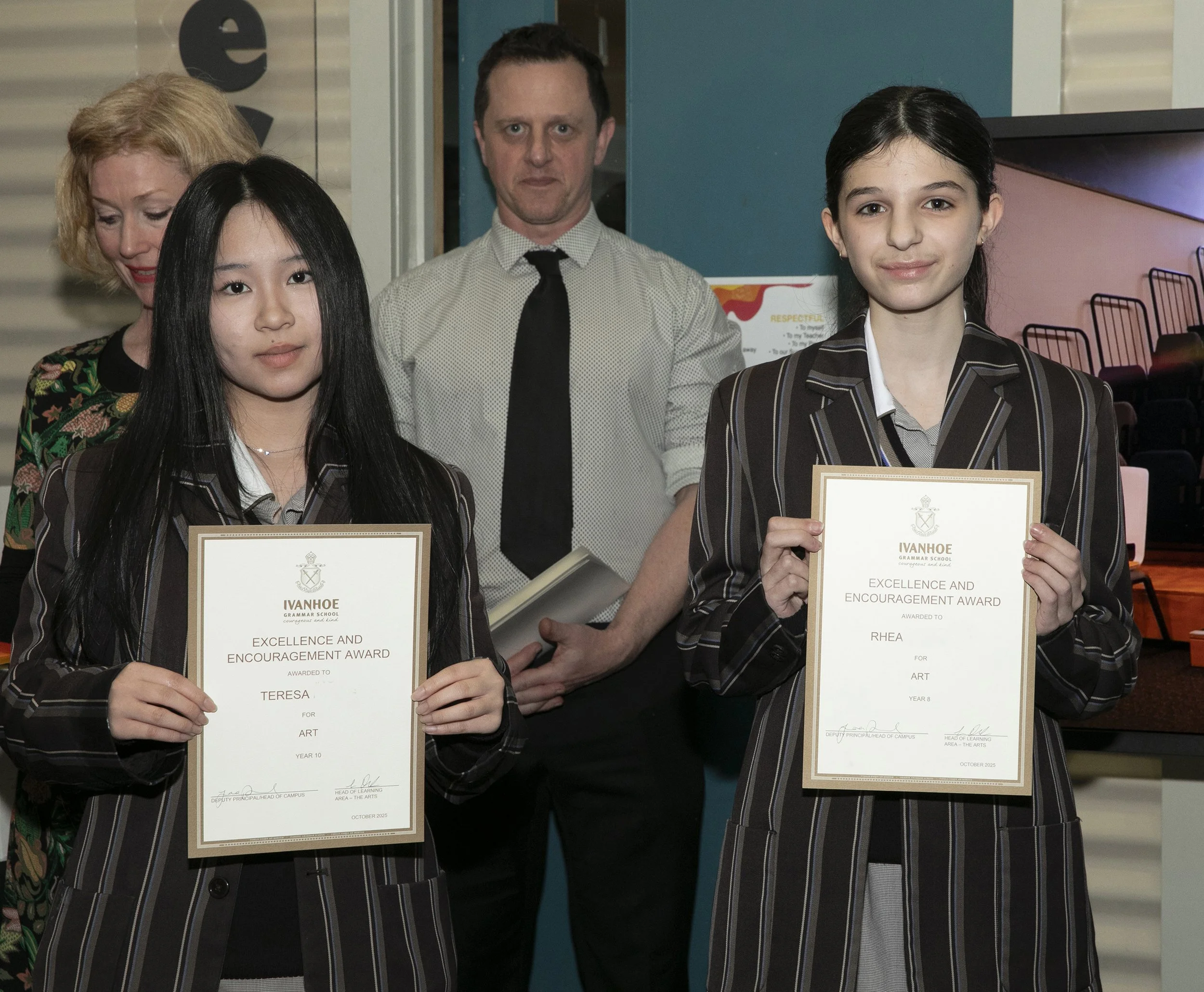 Excellence and Encouragement in Art. 
Left to Right: Teresa Year 10, Rhea Year 8 