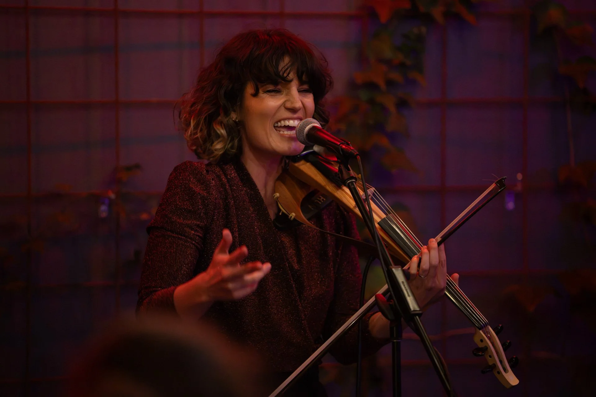 Female musician performing live on stage