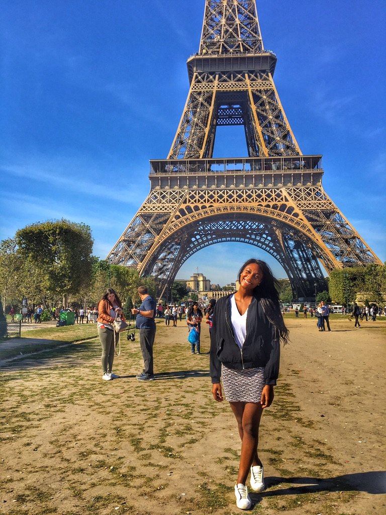 American au pair in Paris at the Eiffel Tower