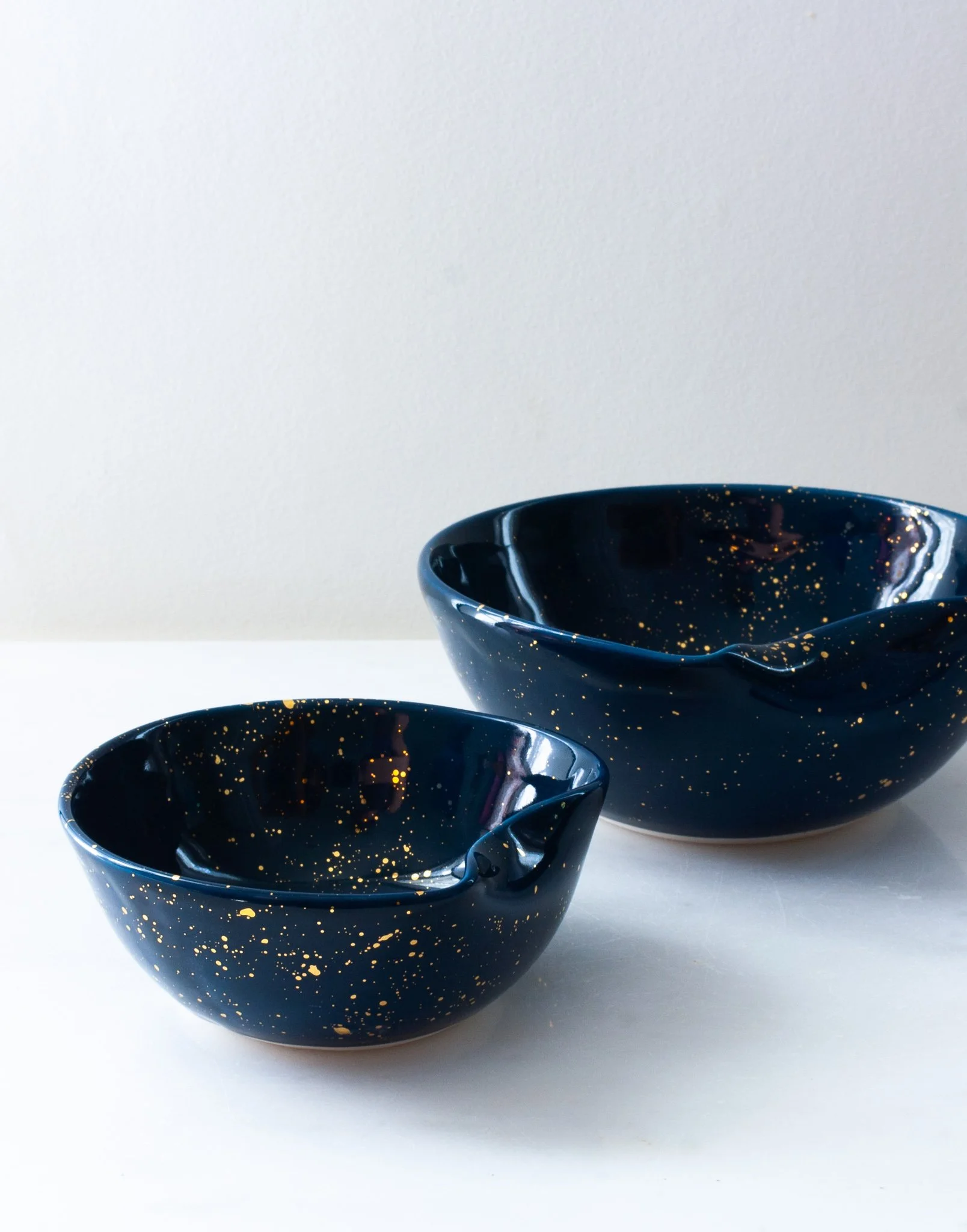 navy pour bowls with splatter set of 2 unstacked.jpg