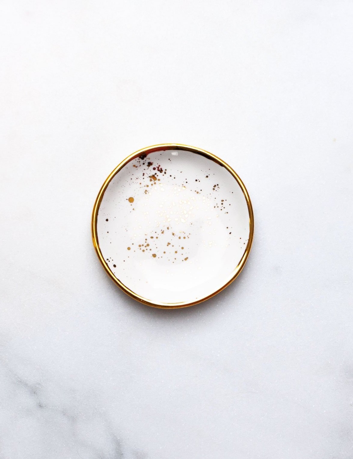 ring-dishes-white-and-gold-splatters.jpeg