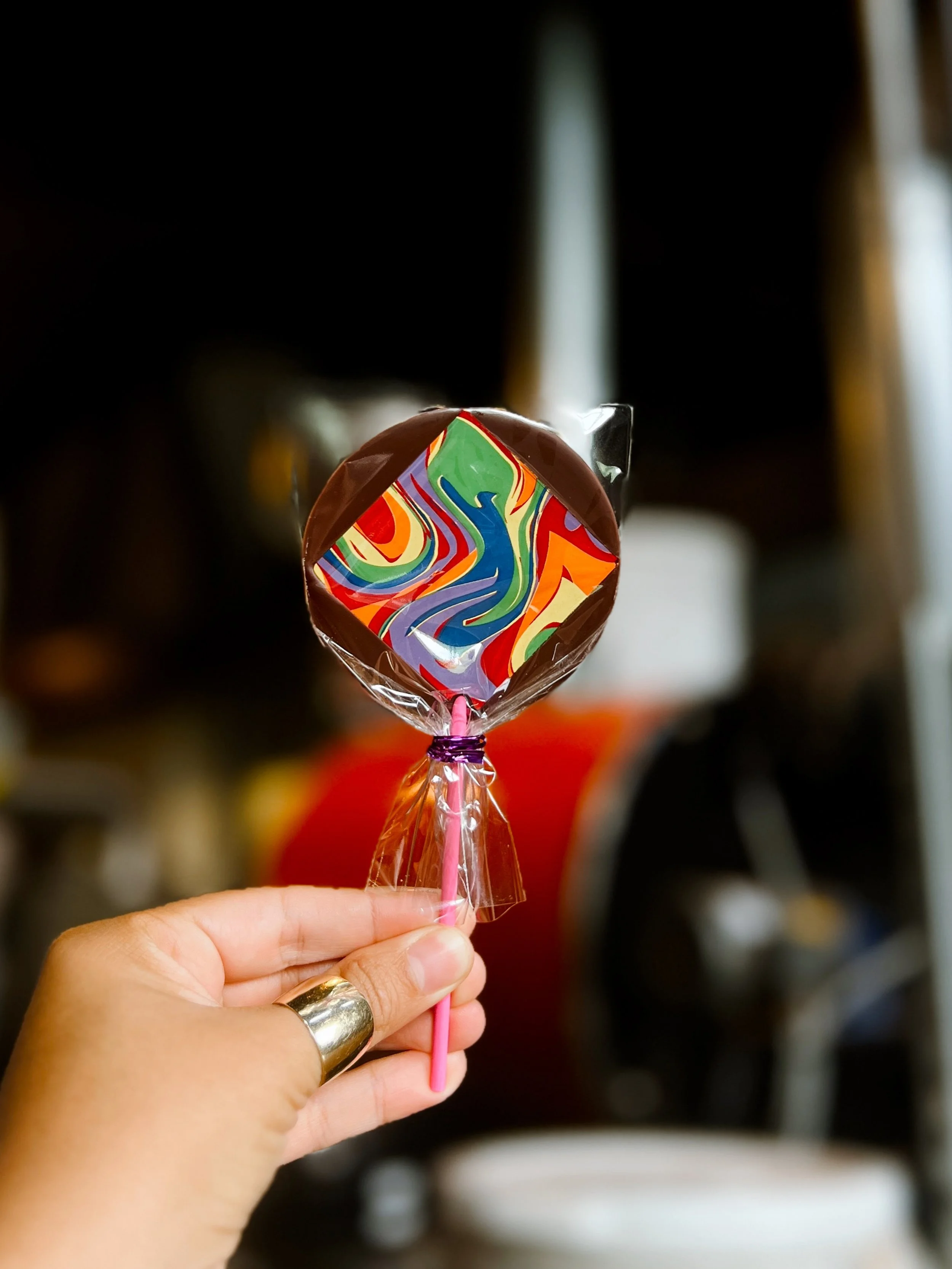 Pride looks pretty sweet around here. 🌈

Celebratin&rsquo; with our Pride Chocolate Pop, handcrafted from our signature 55% dark milk chocolate 😋

Available all month long at the factory!