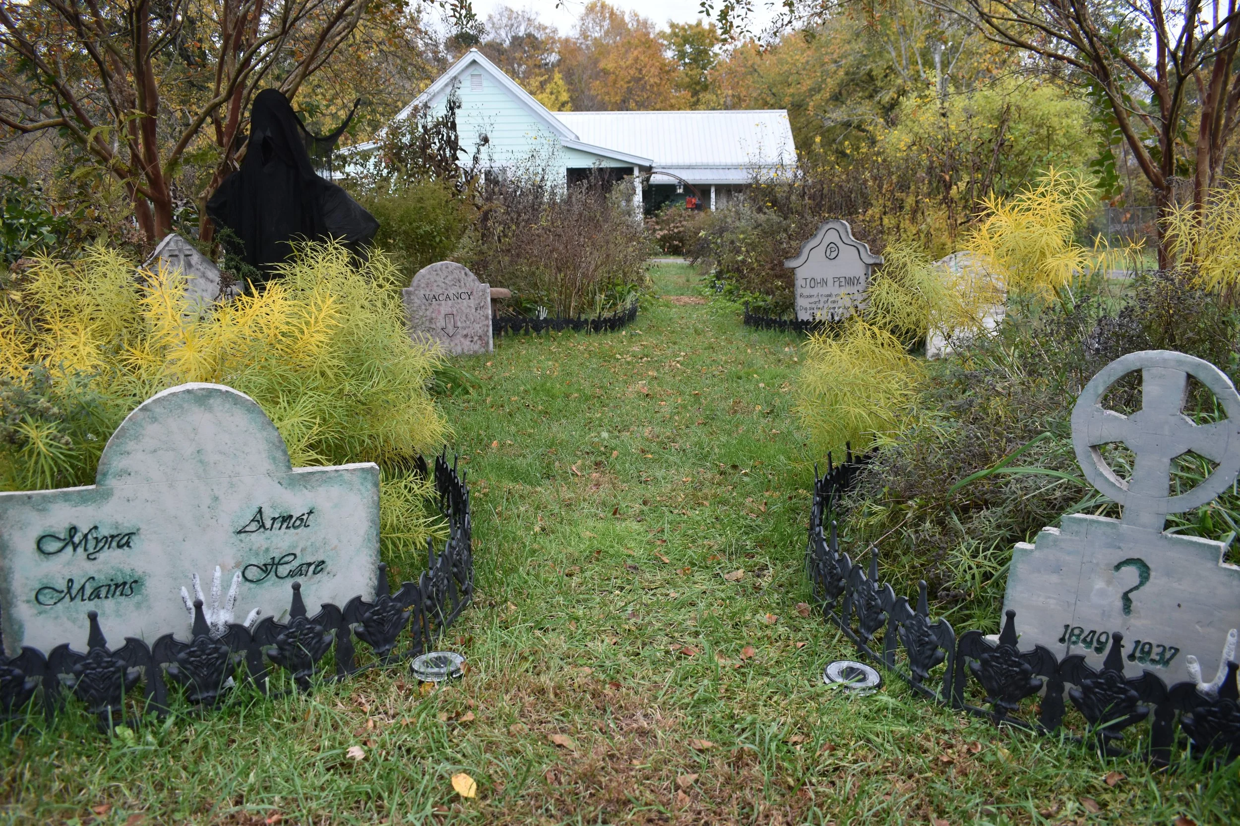 flower garden with fake tombstones