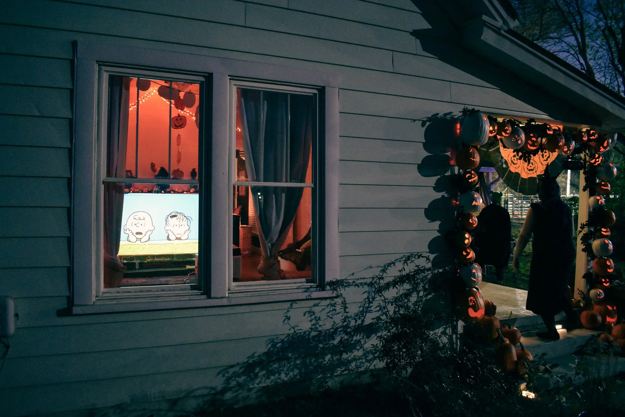 a look into a window where a film plays on screen