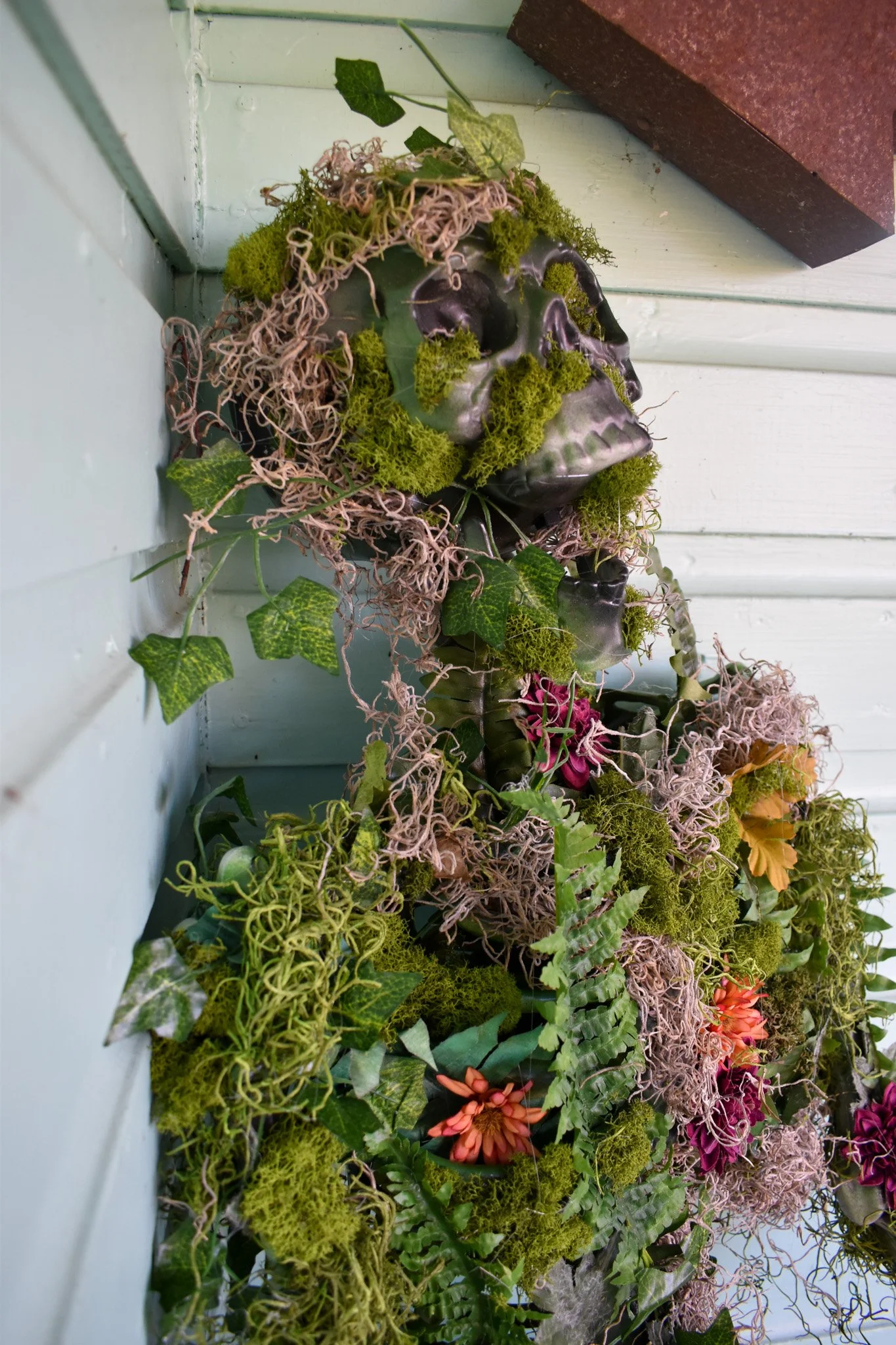 moss covered skeleton