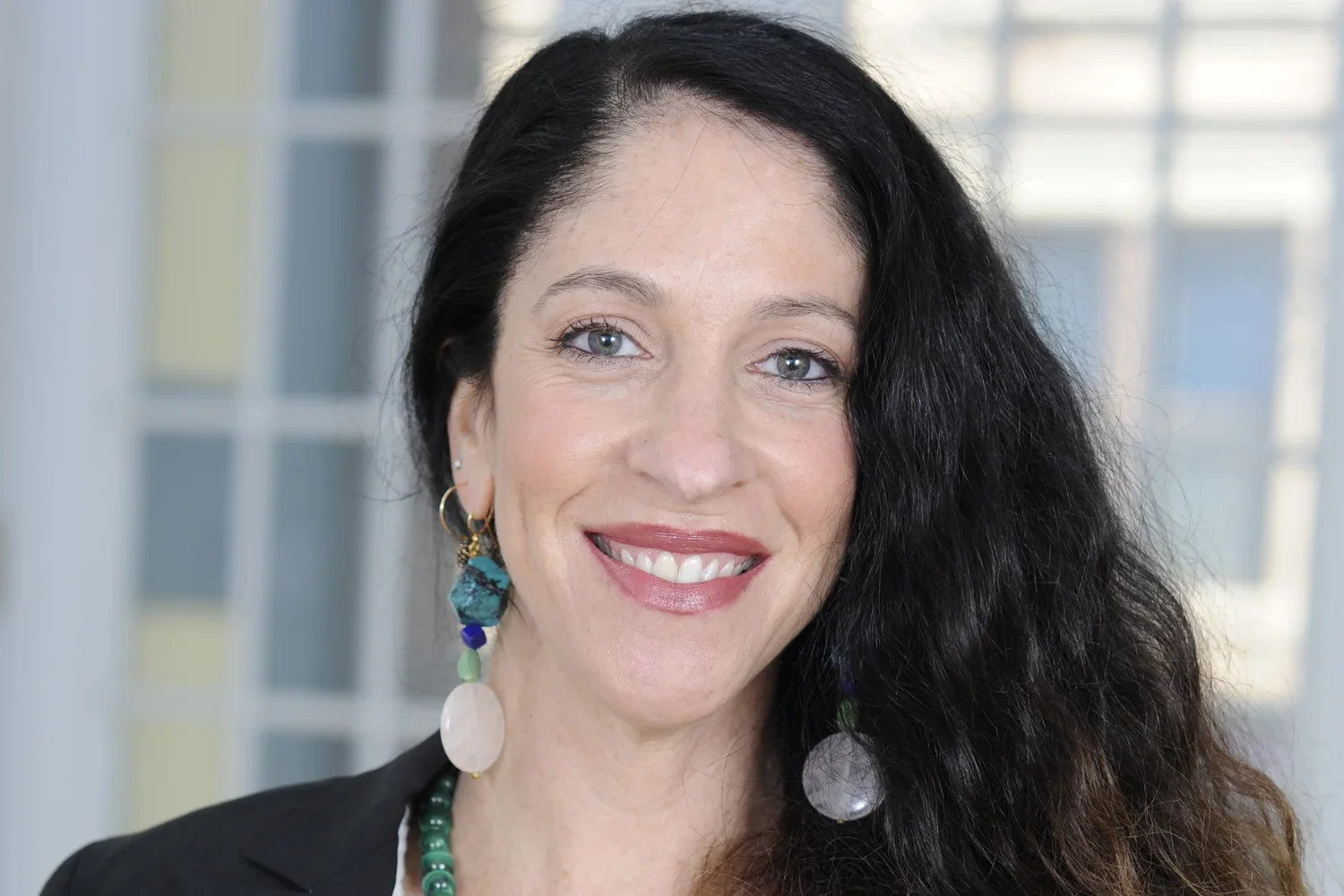 Headshot of a prenatal yoga instructor and doula.
