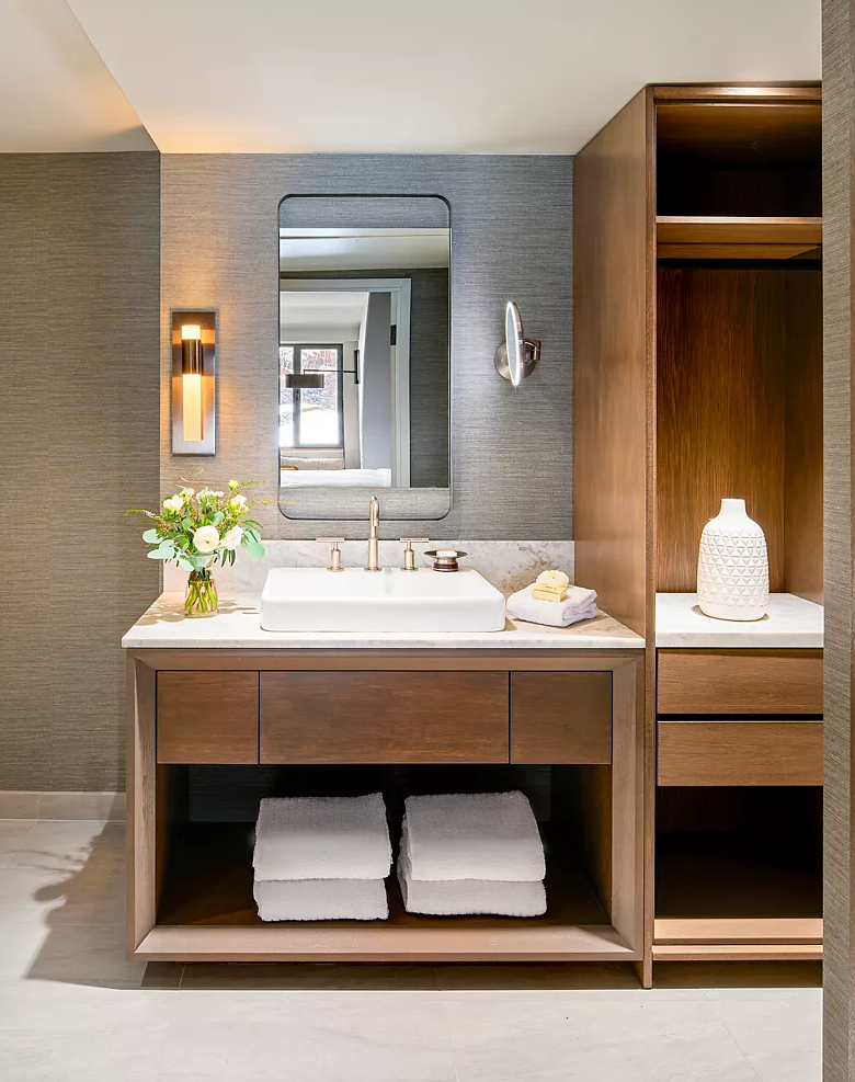 Custom hotel bathroom vanity at Fairmont Tremblant provided by Artco Hospitality Furnishings