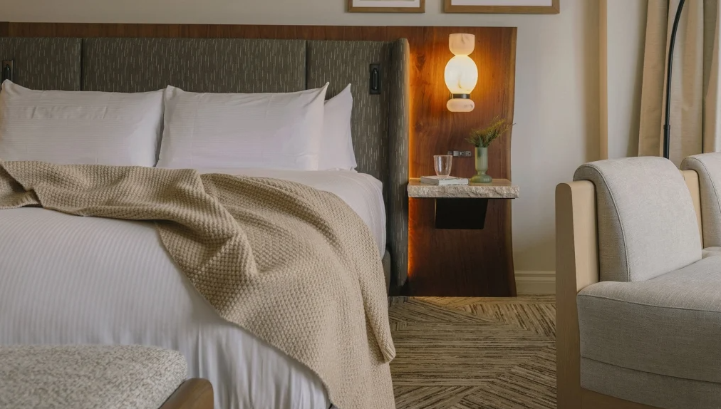 Custom guestroom and suite furniture at Rimrock Banff provided by Artco Hospitality Furnishings