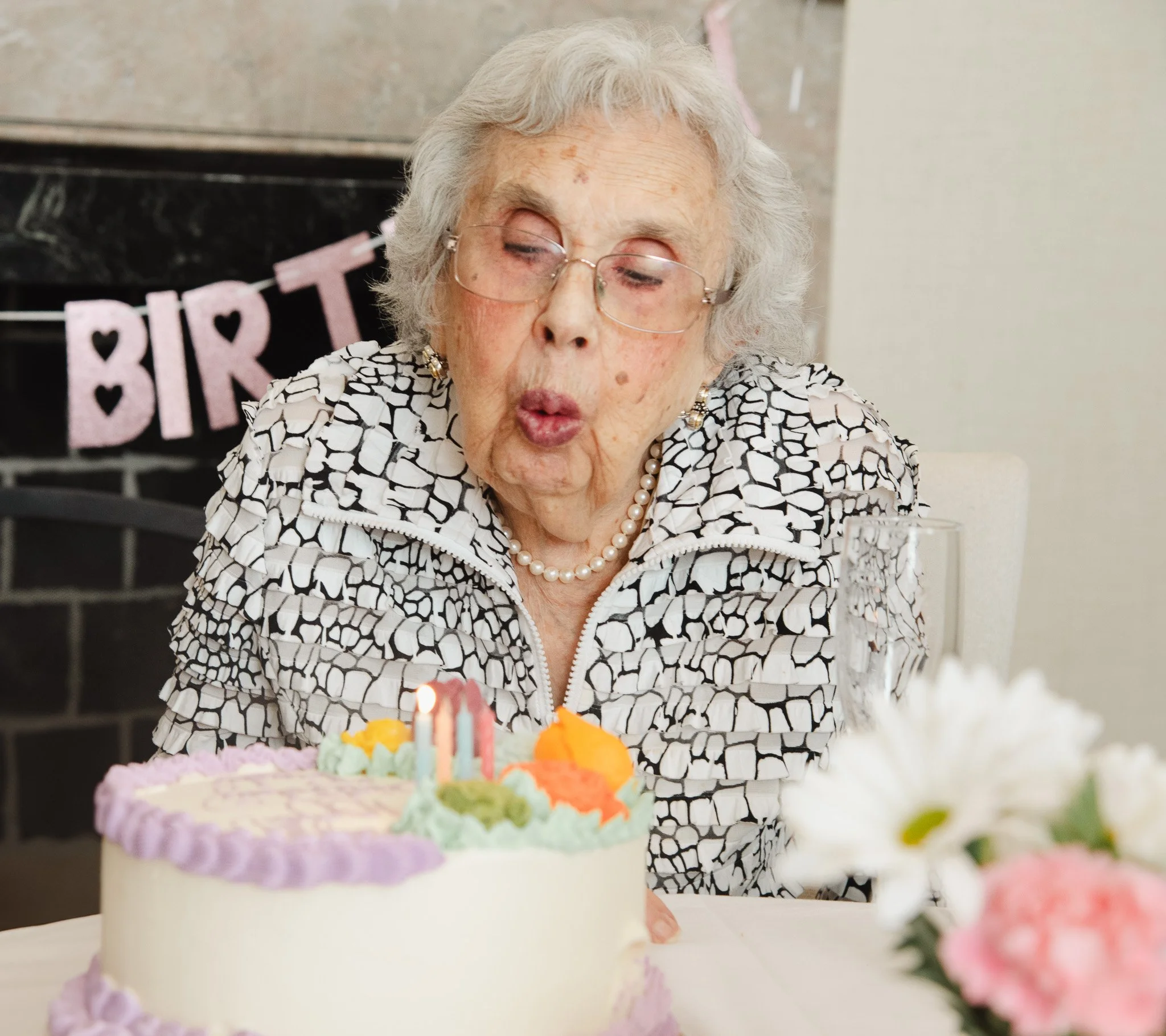 "Breaking News, Woman Turns 100 and is Celebrated by Family."