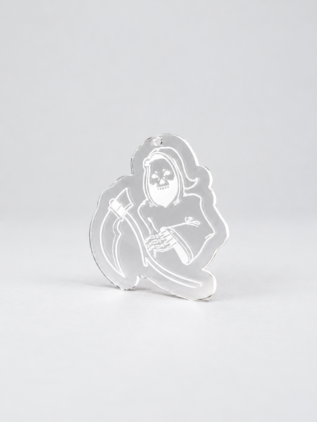 Clear Acrylic Grim Reaper Charm (1).png