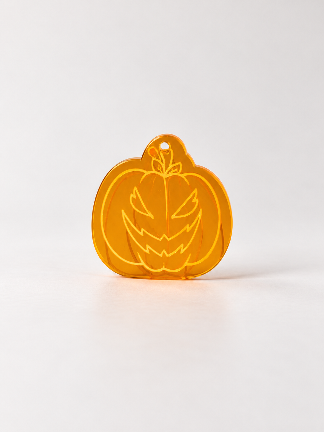 Translucent Pumpkin Jack-o’-Lantern Charm.png