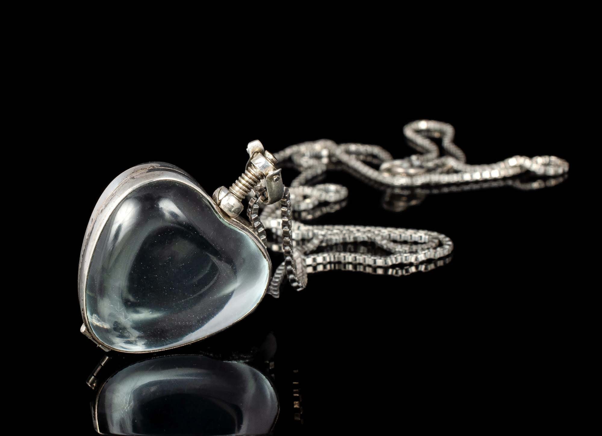 Clear Tribute necklace urns and glass memorial pendants as a touching memory