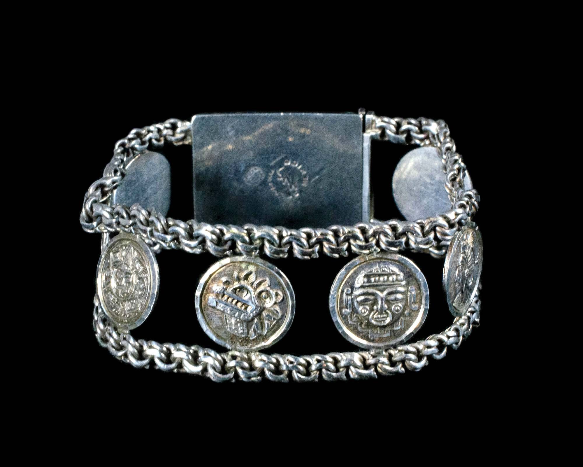 Mexican silver and archeological figural "disk" links Bracelet