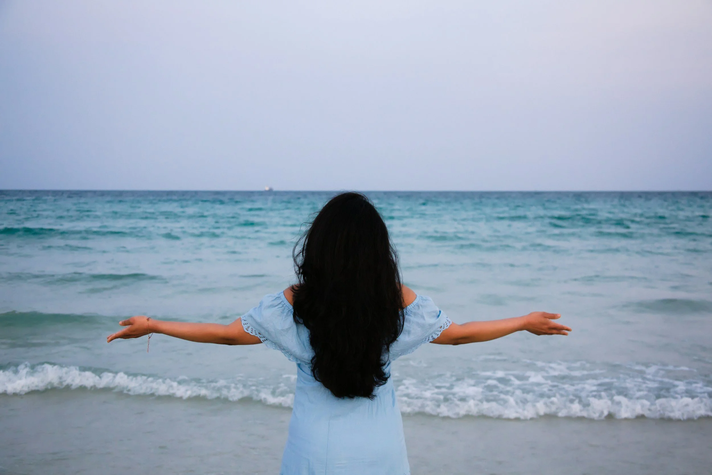 Woman In Houston near the beach - anxiety therapy in Houston