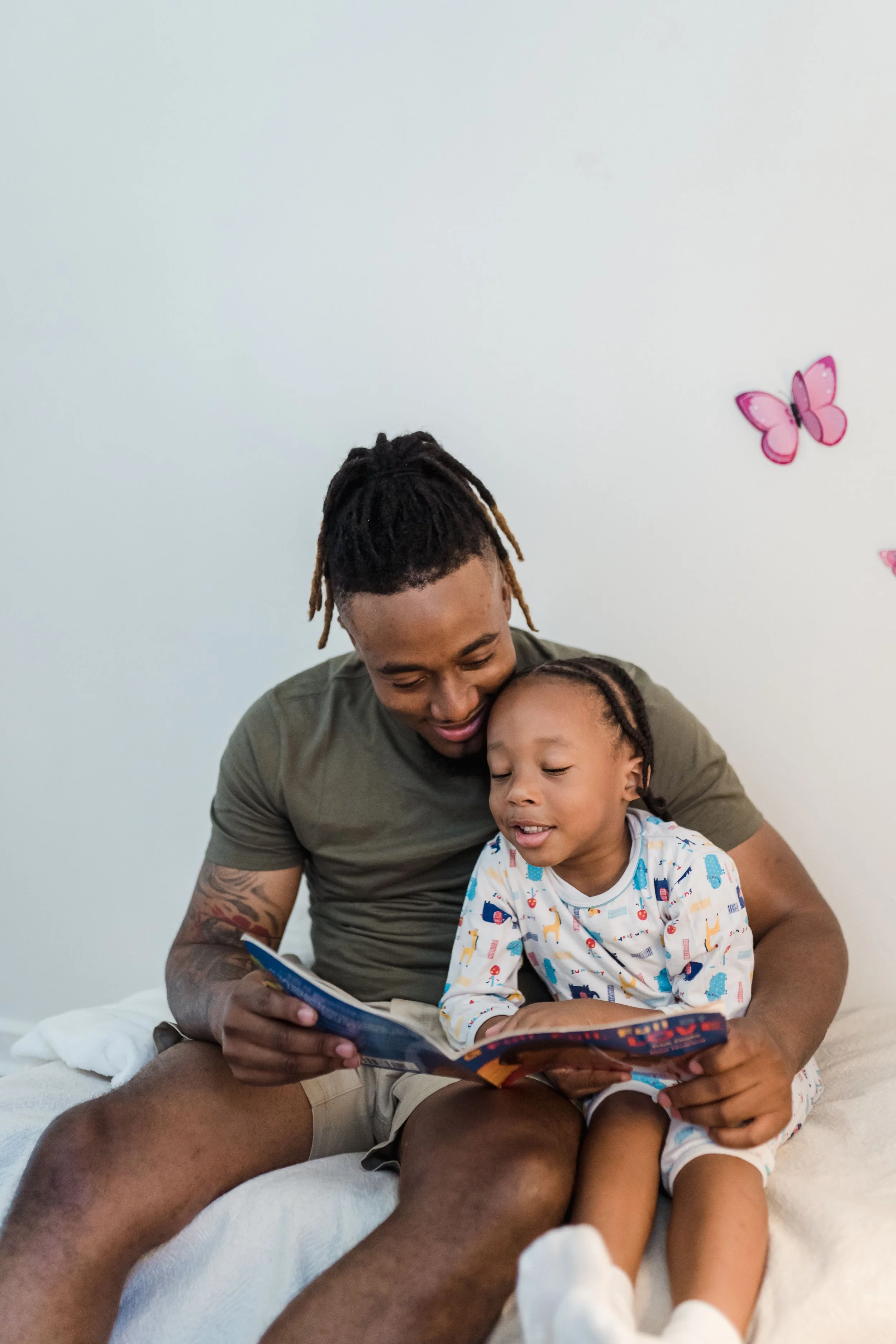Father in Memorial, TX Reading To His Son About Mental Health
