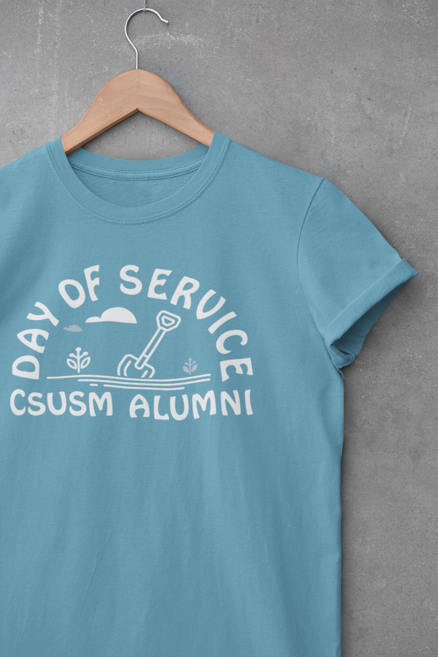 mockup-of-a-crewneck-t-shirt-hanging-by-a-cement-wall-33686.png