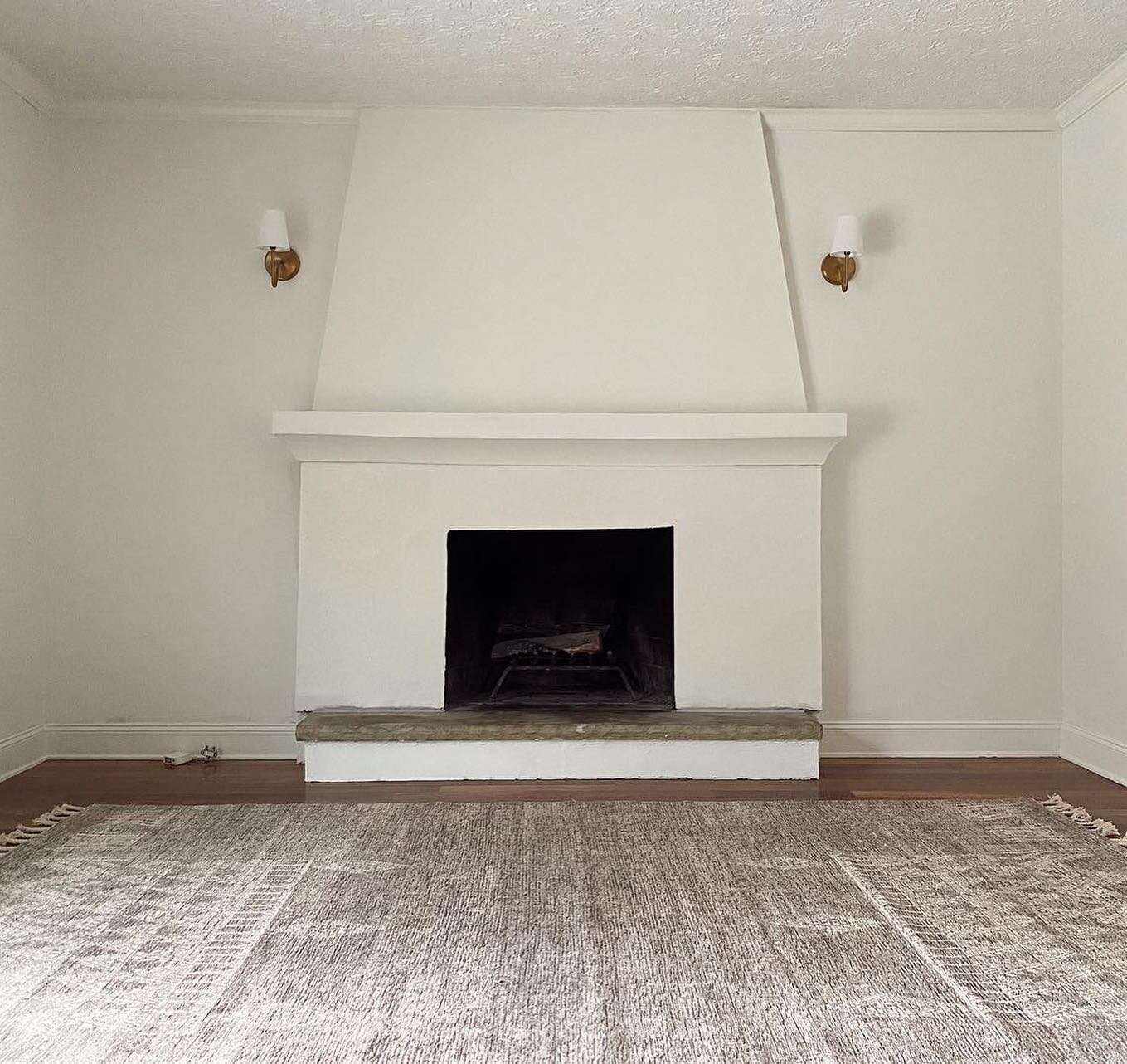 A few finishing touches left to be made as we wait on some deliveries, but we&rsquo;re really freakin proud of how this space is turning out. After a few weeks of renovating, we finally get our living room back tonight&mdash; Jake already has a fire 