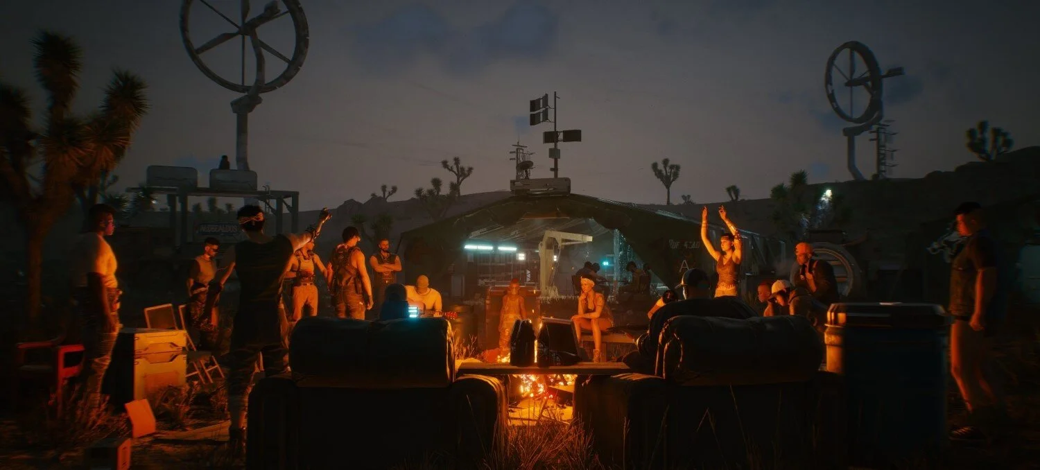 An Aldecaldo camp congregating over a fire in the Badlands