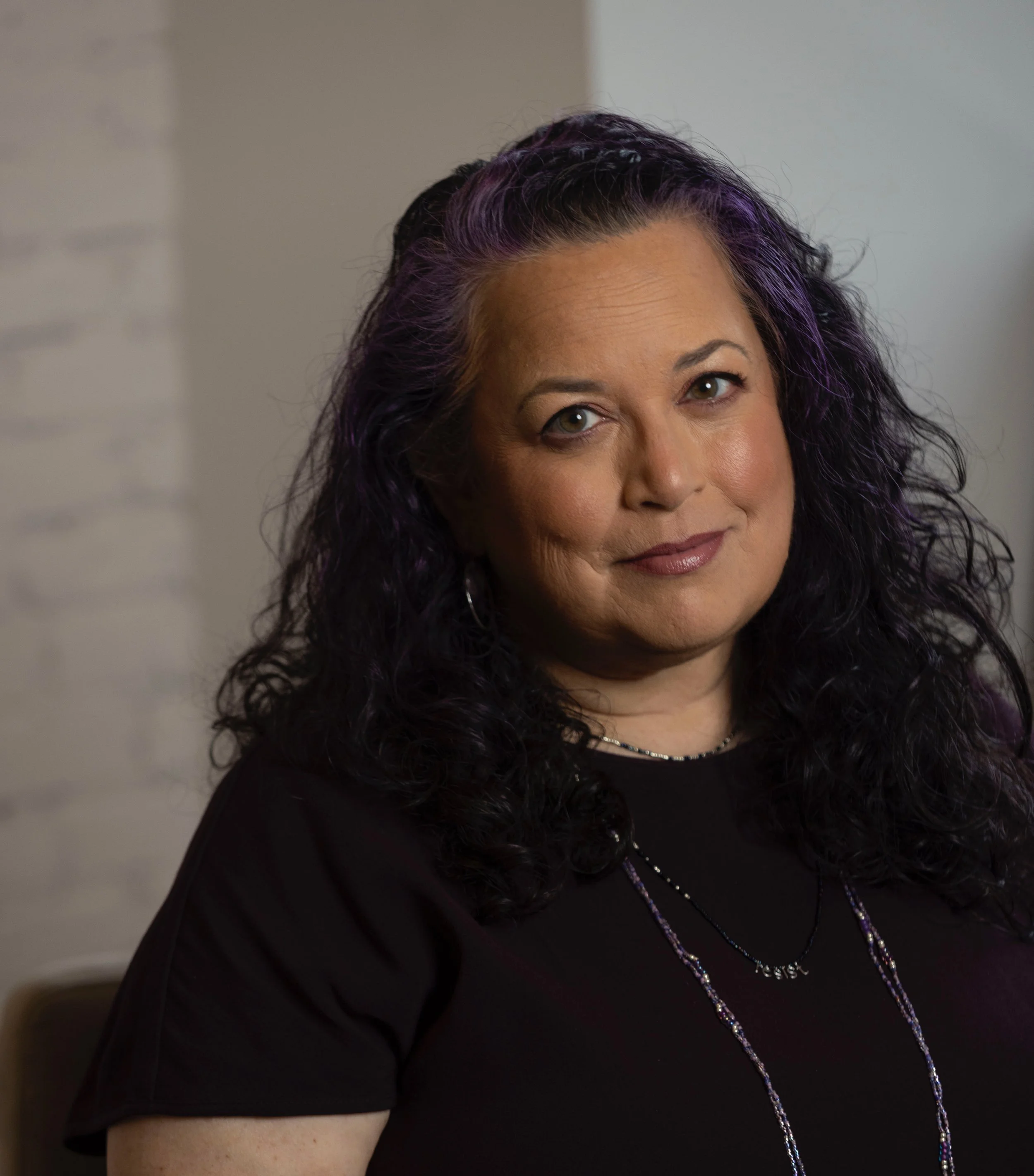 Elisa Camahort Page headshot. Woman with dark hair with purple highlights.