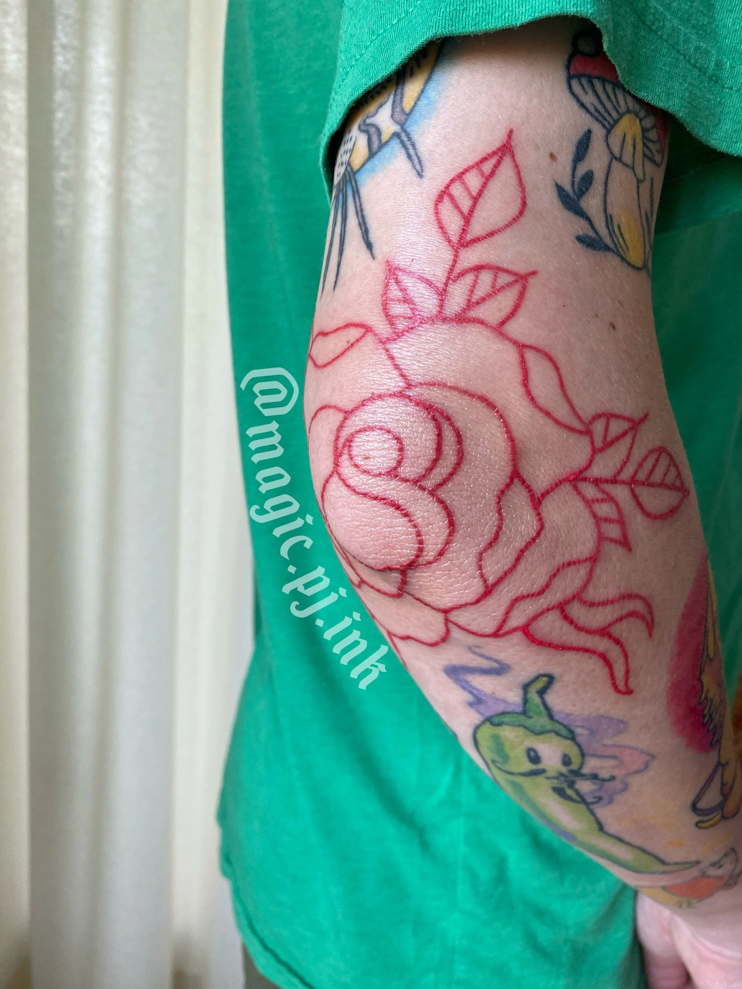 Red line only rose tattoo on elbow my Magic PJ Utrecht