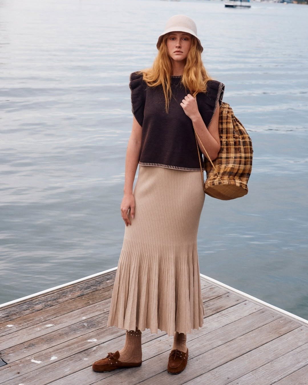 The Athena Frill Knit Top from @isleofmine features a soft marle knit in a wool-blend, with layered flutter sleeves and contrast blanket stitch detailing, designed to bring texture and warmth to everyday looks.

⁠
_____________________________⁠
⁠
🌟F