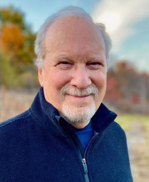 David Zemach-Bersin. Elderly man smiling outdoors