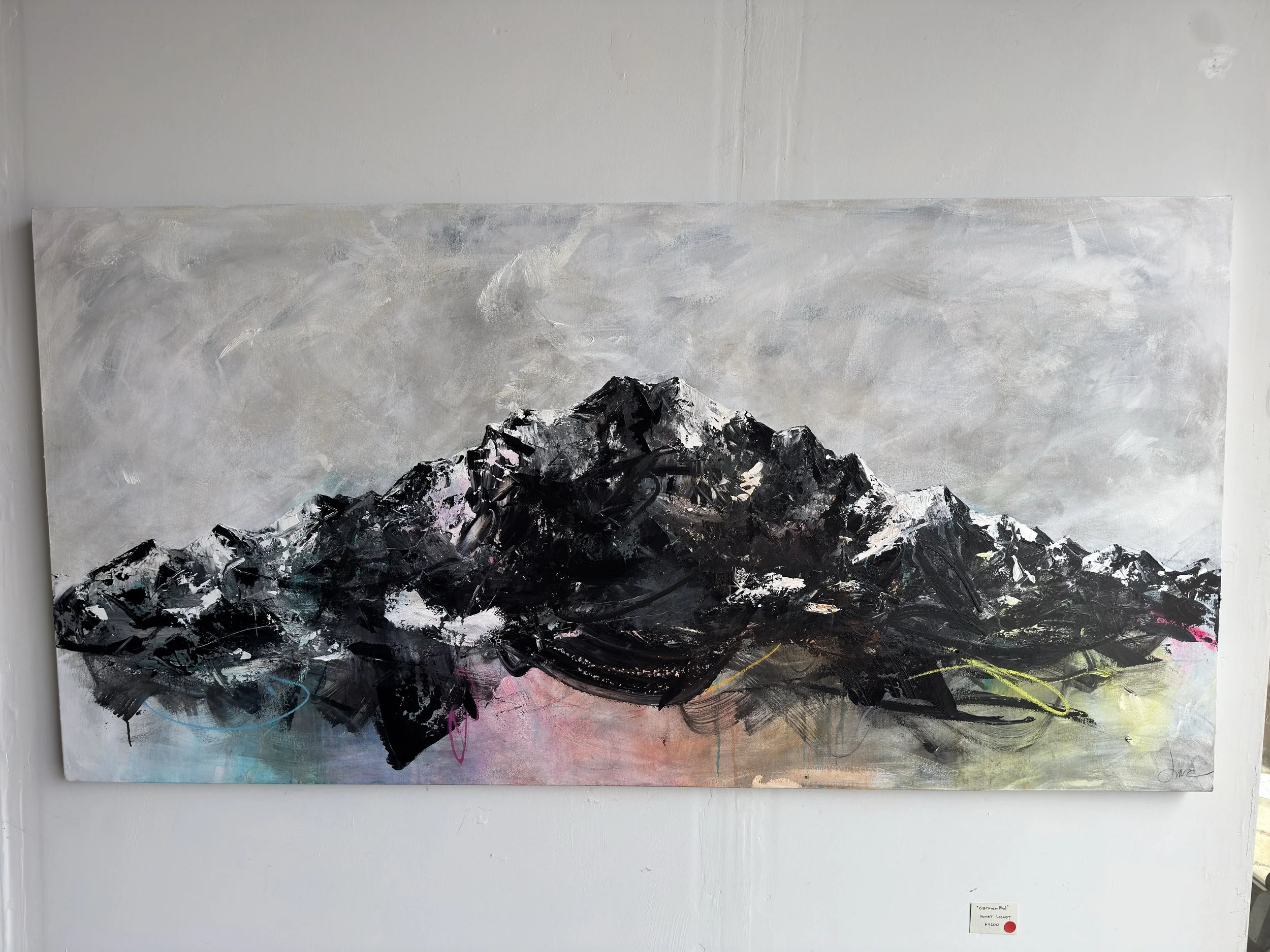 Rainbow Acrylic mountain landscape on the wall at Prism Workspaces Female artist, Denver Colorado
