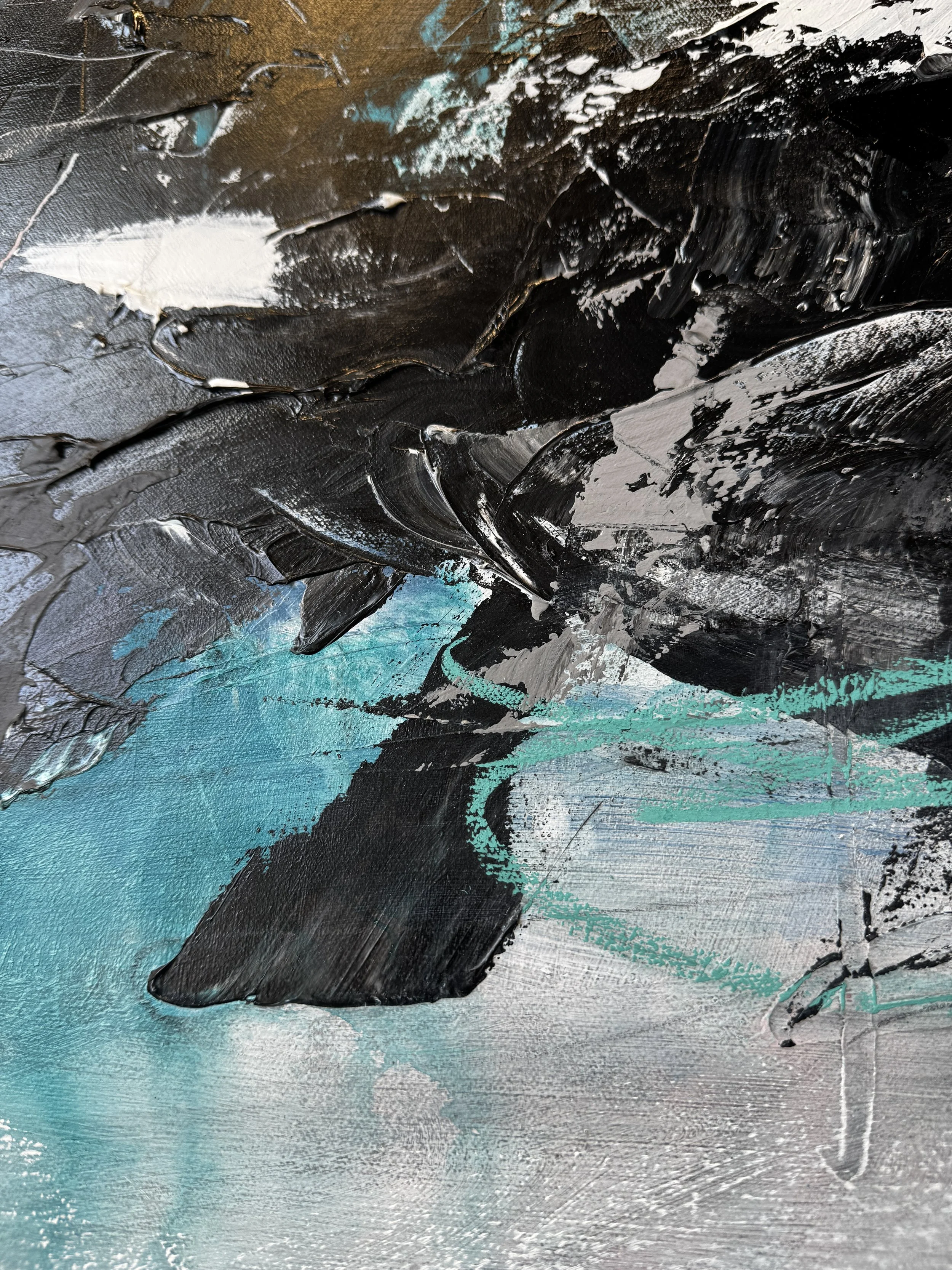 Close-up detail of teal and pink brushwork on black and white mountain painting