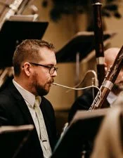 Photo of Josh Fleming playing the bassoon