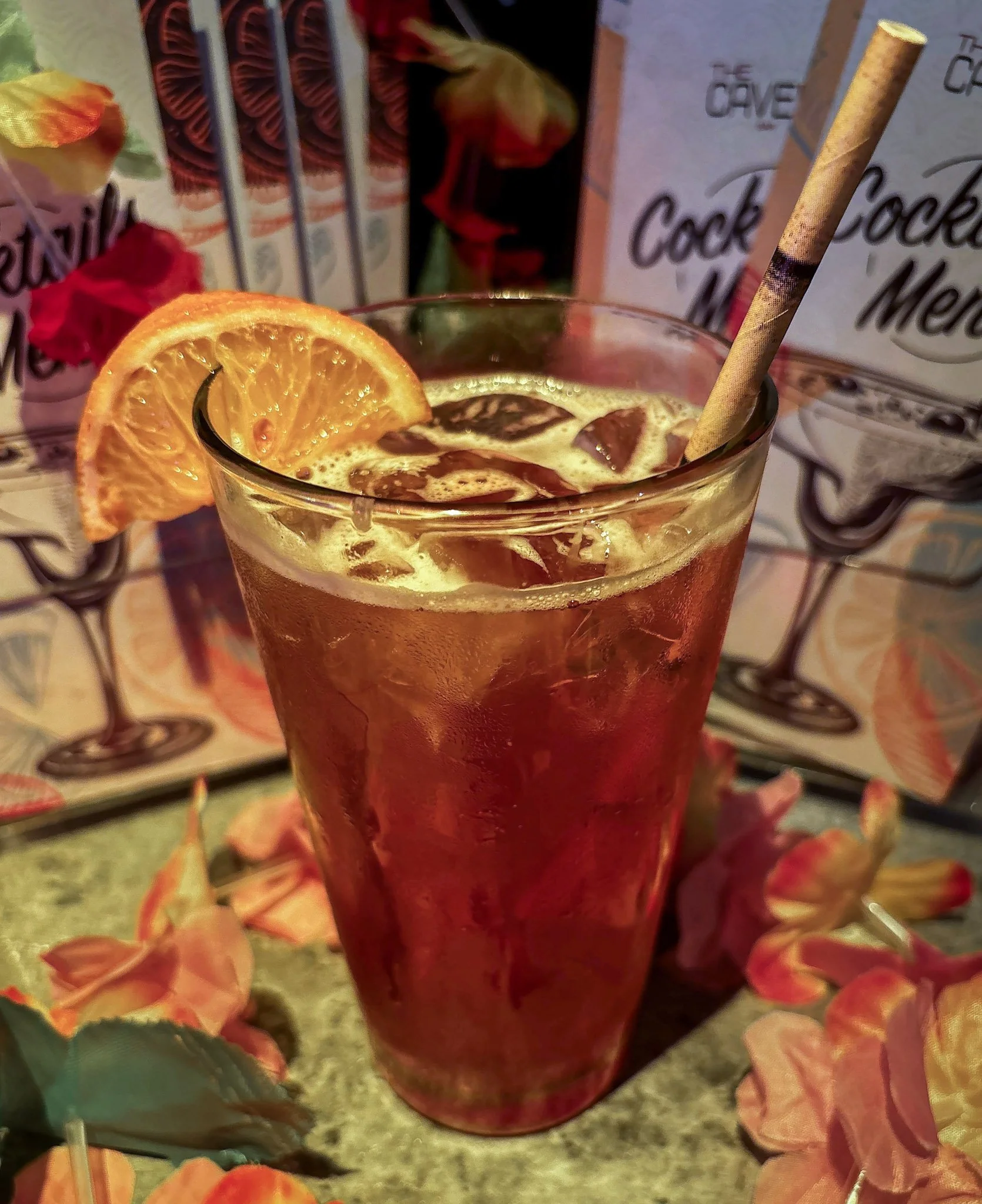Banana Mama:
Dark Rum, Coconut Liqueur, Banana Liqueur, Coffee Liqueur, Exotic Fruit Juices & a Splash of Grenadine

Packed with tropical flavours and a generous helping of dark rum, this cocktail is as smooth as it is delicious.

Warning: It's highl