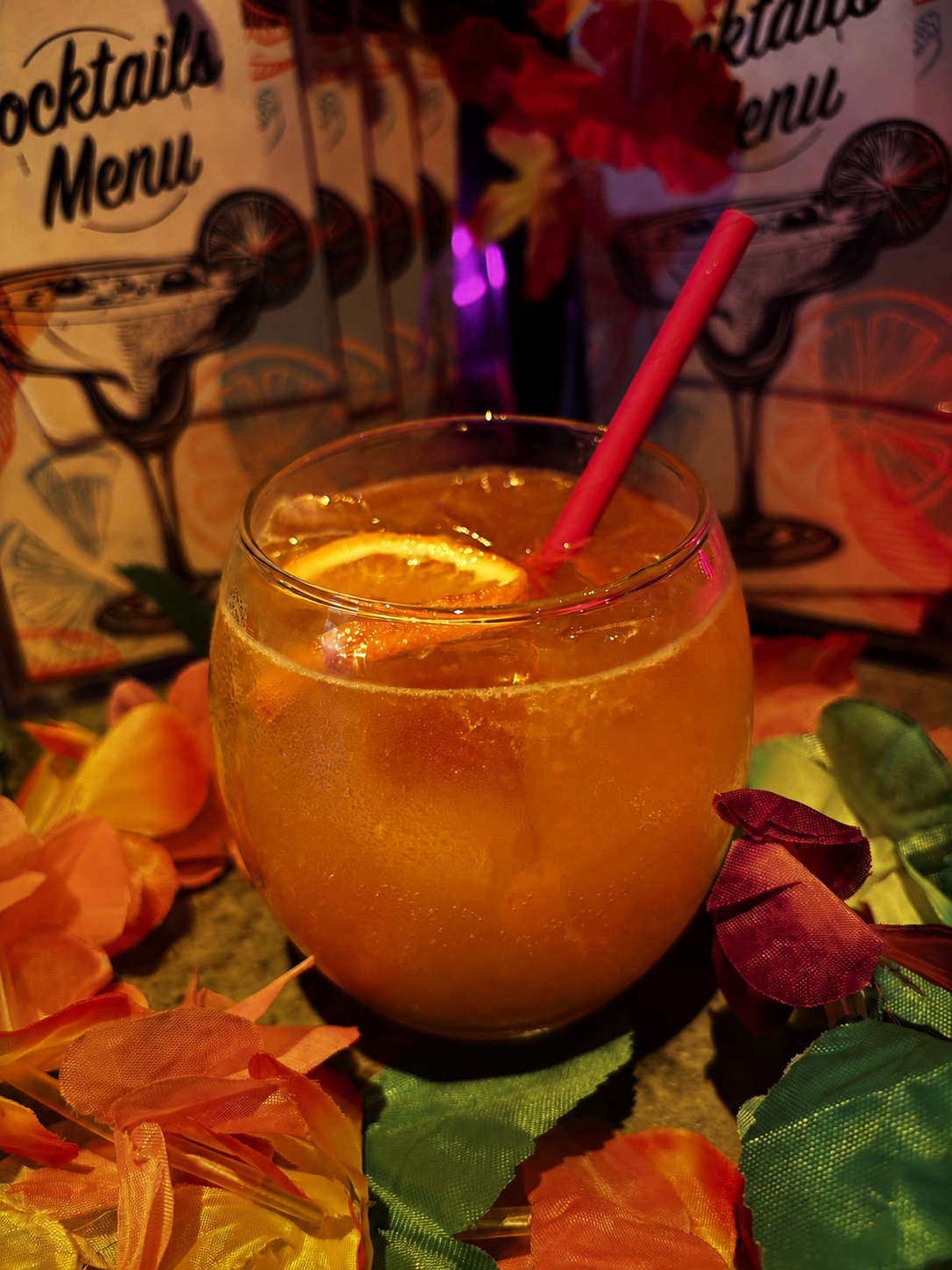Sex on the Beach:

Vodka, Fresh Orange Juice, Pineapple Juice & Peach Schnapps

It may look like a simple glass of orange juice, but don't be fooled. This fruity favourite packs far more of a punch than it lets on!