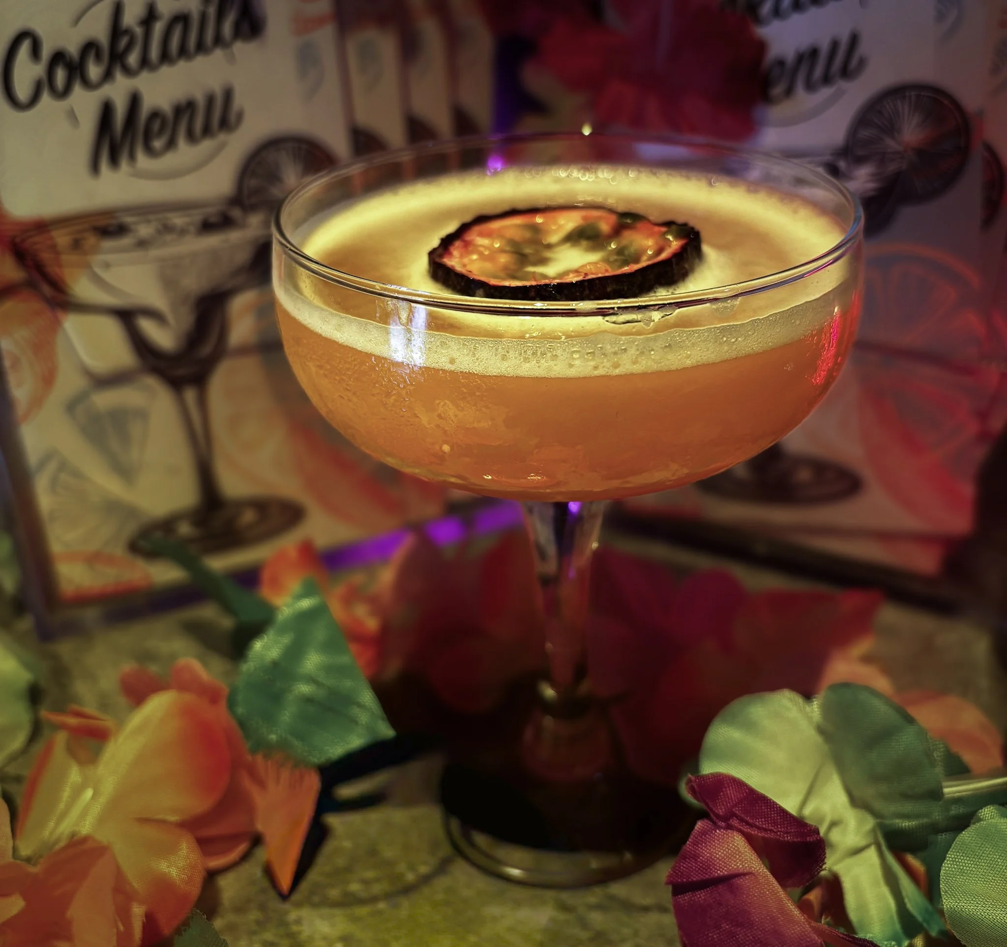 Pornstar Martini: 

42 Below Vodka, Vanilla, Passion Fruit Liqueur, Passion Fruit Juice & Lime Juice

Created by legendary bartender Douglas Ankrah, the Pornstar Martini has become one of the world's favourite cocktails. Sweet, tropical and perfectly