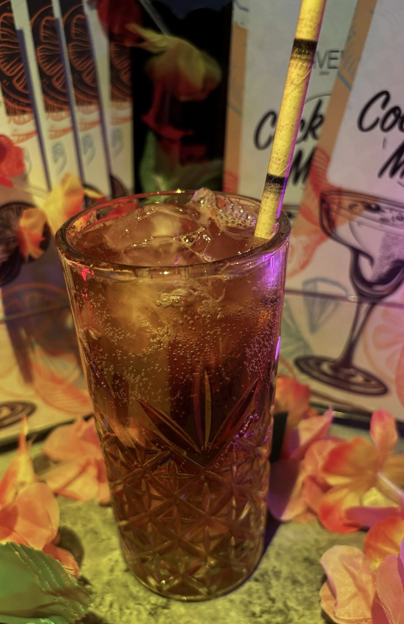 Long Island Ice Tea:

Vodka, Gin, Tequila, White Rum, Triple Sec, Lemon & Coca-Cola

One of the world's most iconic cocktails. An eyebrow-raising blend of five white spirits—vodka, gin, tequila, white rum and Triple Sec—balanced with fresh lemon and 