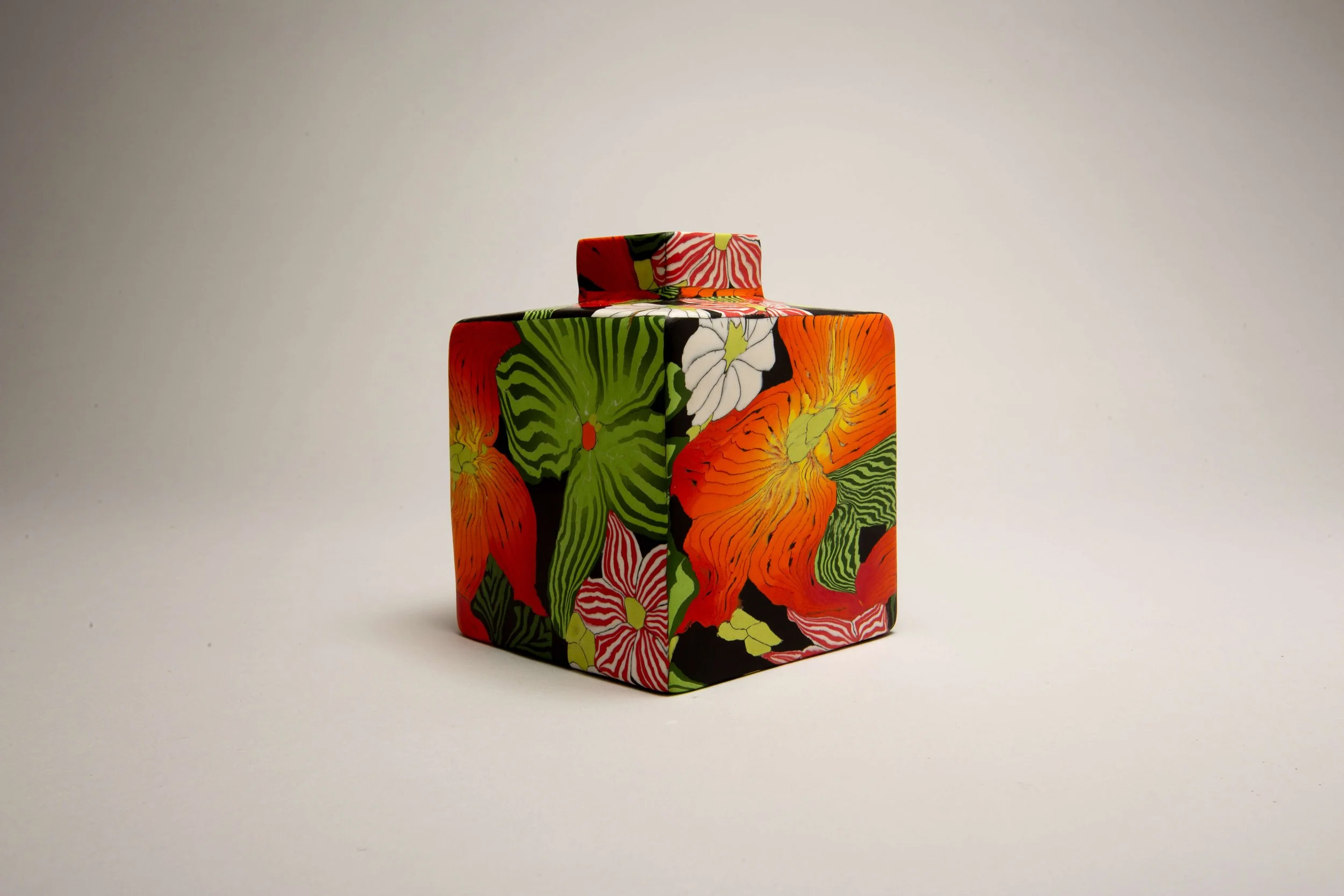 Cubed Nerikomi bottle
 
 Coloured porcelain 
 9 x 9 x 10  Available from the  CPA  