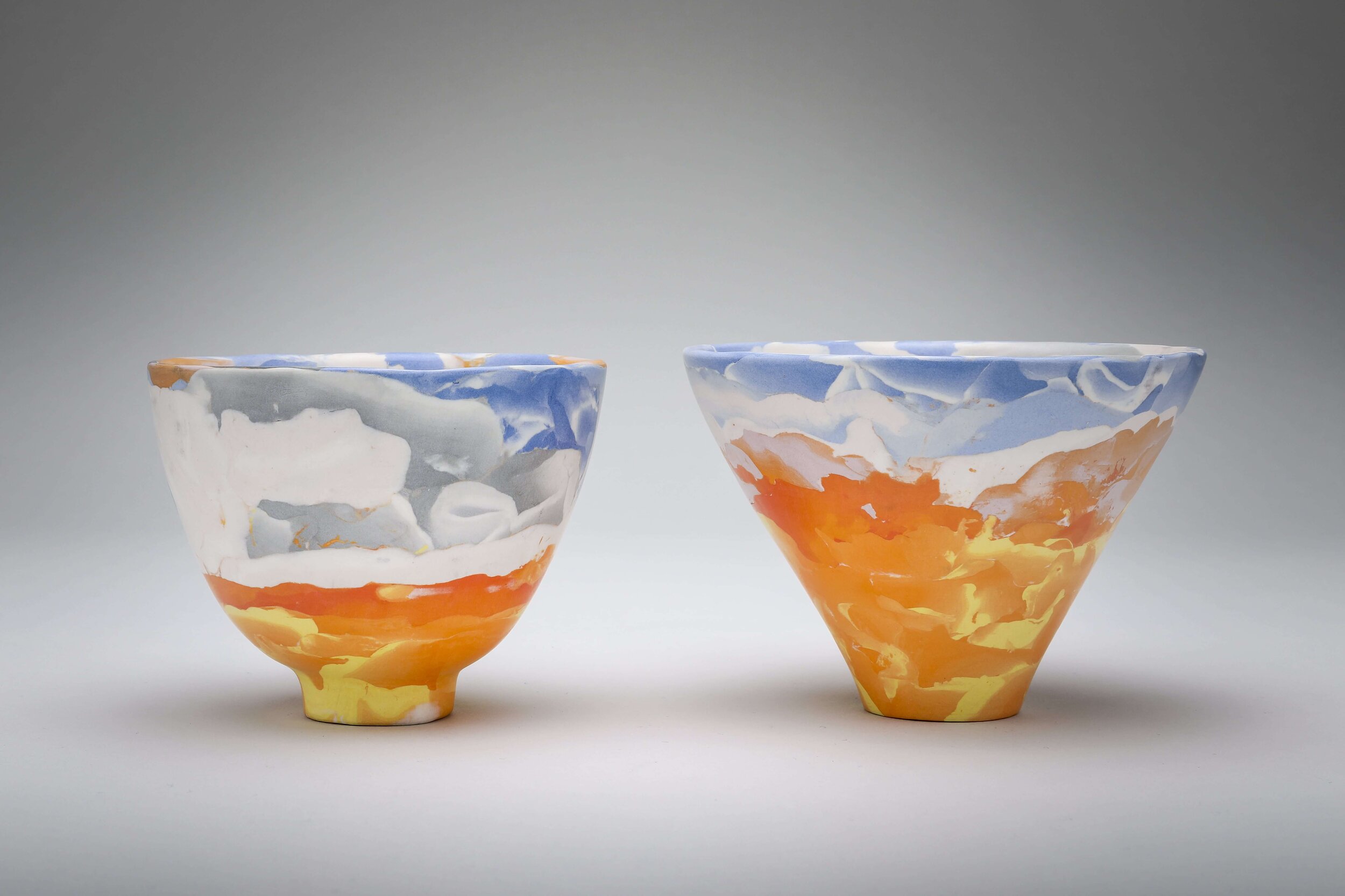 Porcelain Nerikomi bowls with silver Kintsugi