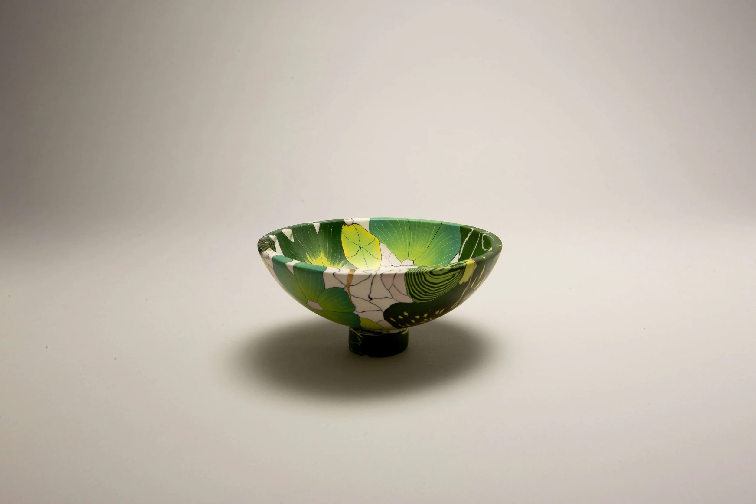 Green and white bowl
 
 Coloured porcelain  
 10 x 6  
 Available from the  CPA  