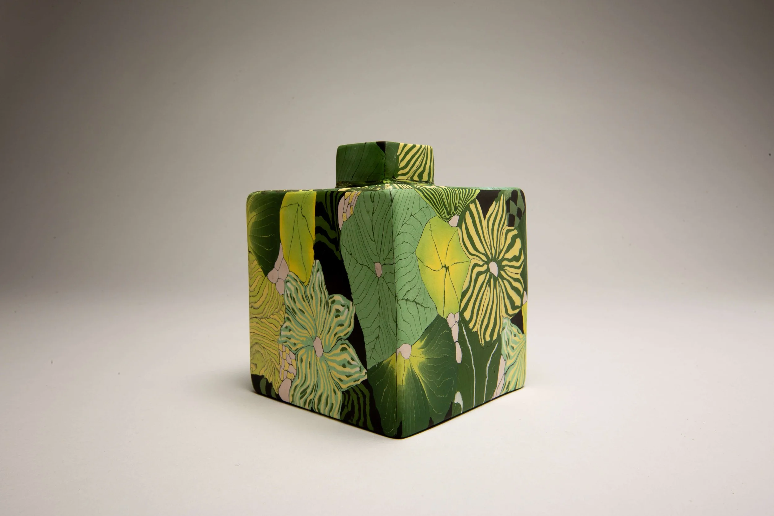 Cubed Nerikomi bottle
 
 Coloured porcelain 
 9 x 9 x 10  Available from the  CPA  