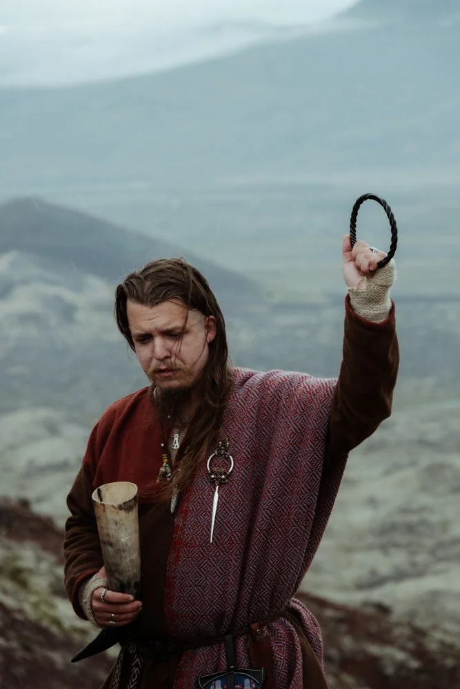 Jökull officiating Ásatrú vow renewal ceremony outdoors in Iceland.