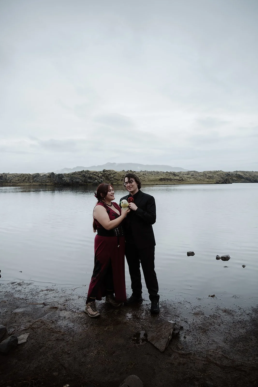 Chey and Joe surrounded by the wild landscape of Snæfellsnes on their wedding day.