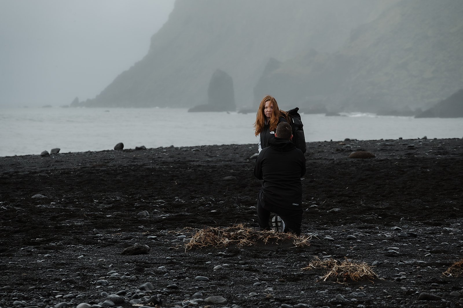 proposal in Vík Iceland on black sand beach
